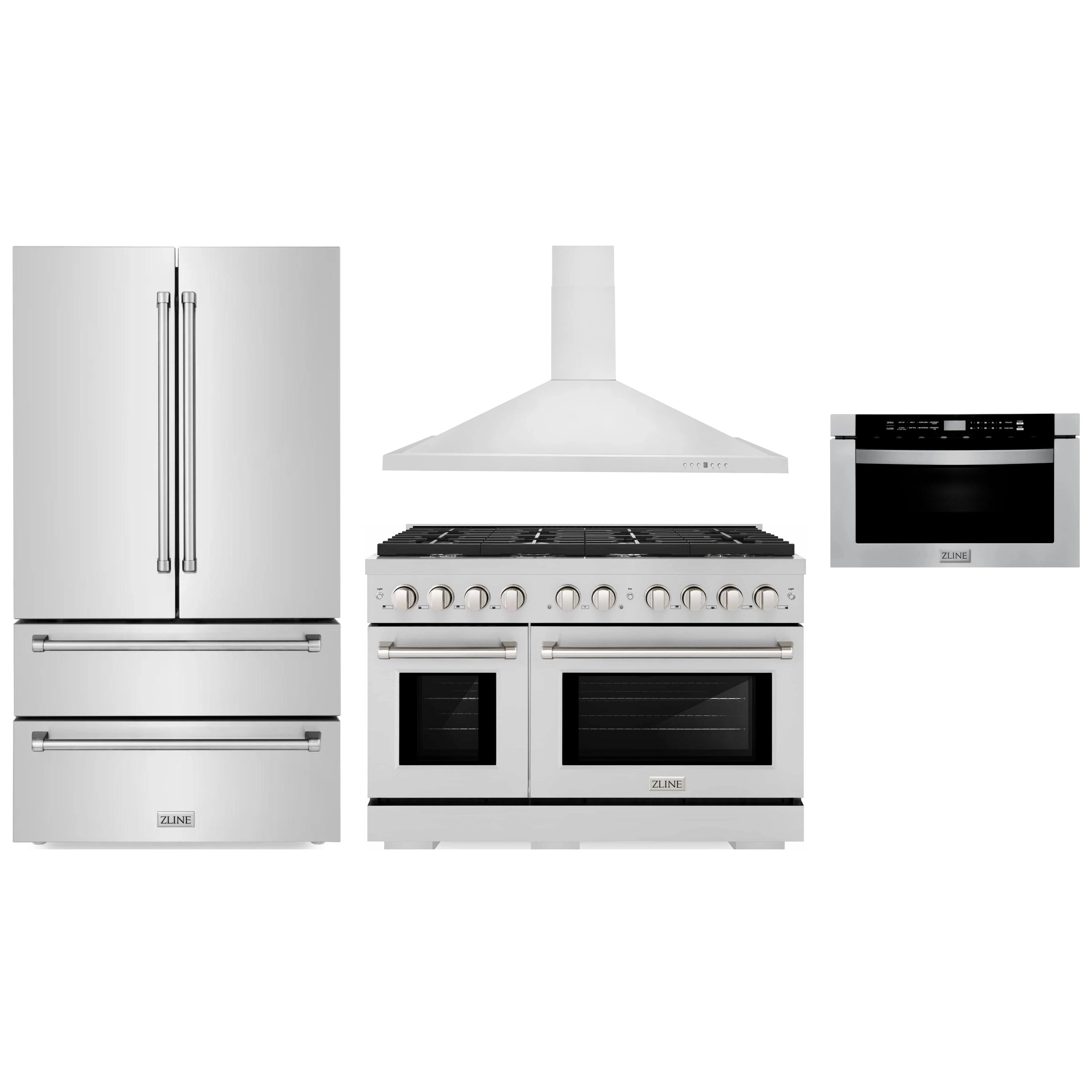 Stainless appliance set: refrigerator, gas range, and wall hood in one view