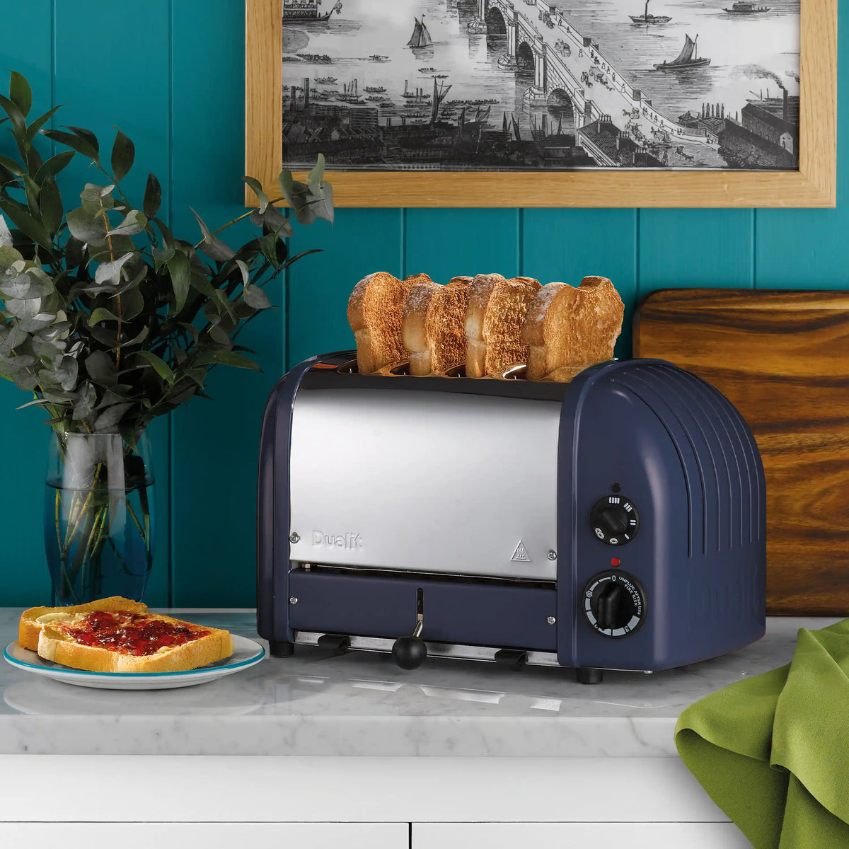 Lavender-blue Dualit 4-slice toaster with control knobs and front lever