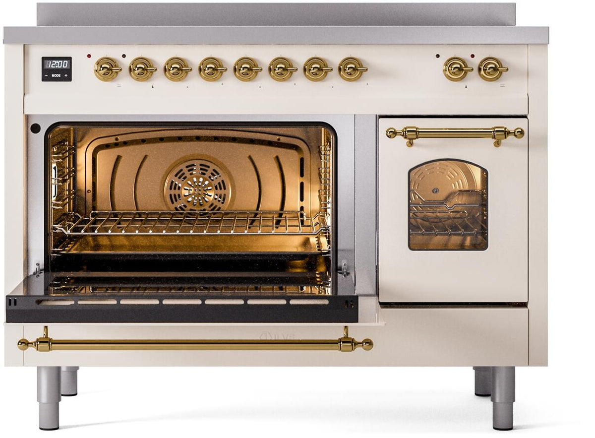 Freestanding electric induction range, left oven open; antique white body with brass hardware
