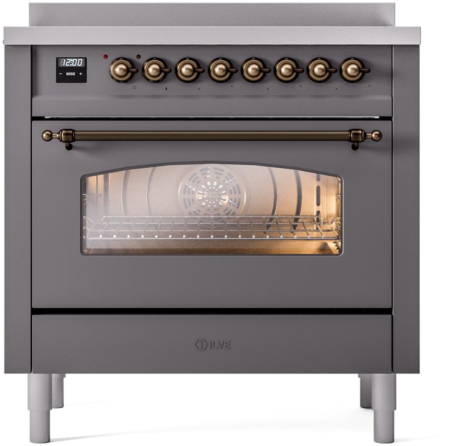 Freestanding electric induction range in matte graphite with bronze-trimmed control knobs