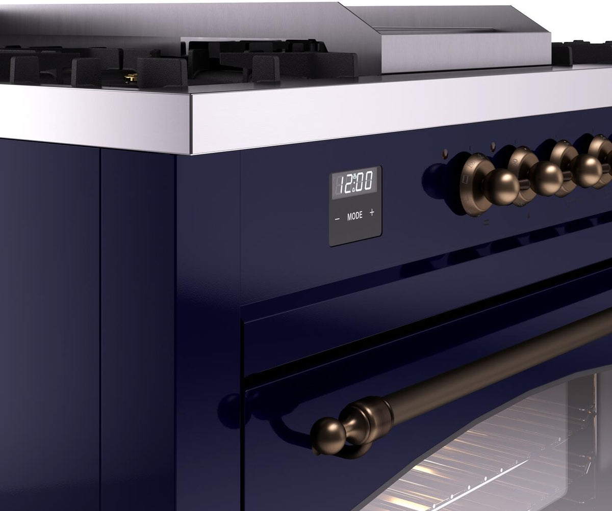 Midnight blue range control panel with MODE display and bronze control knobs