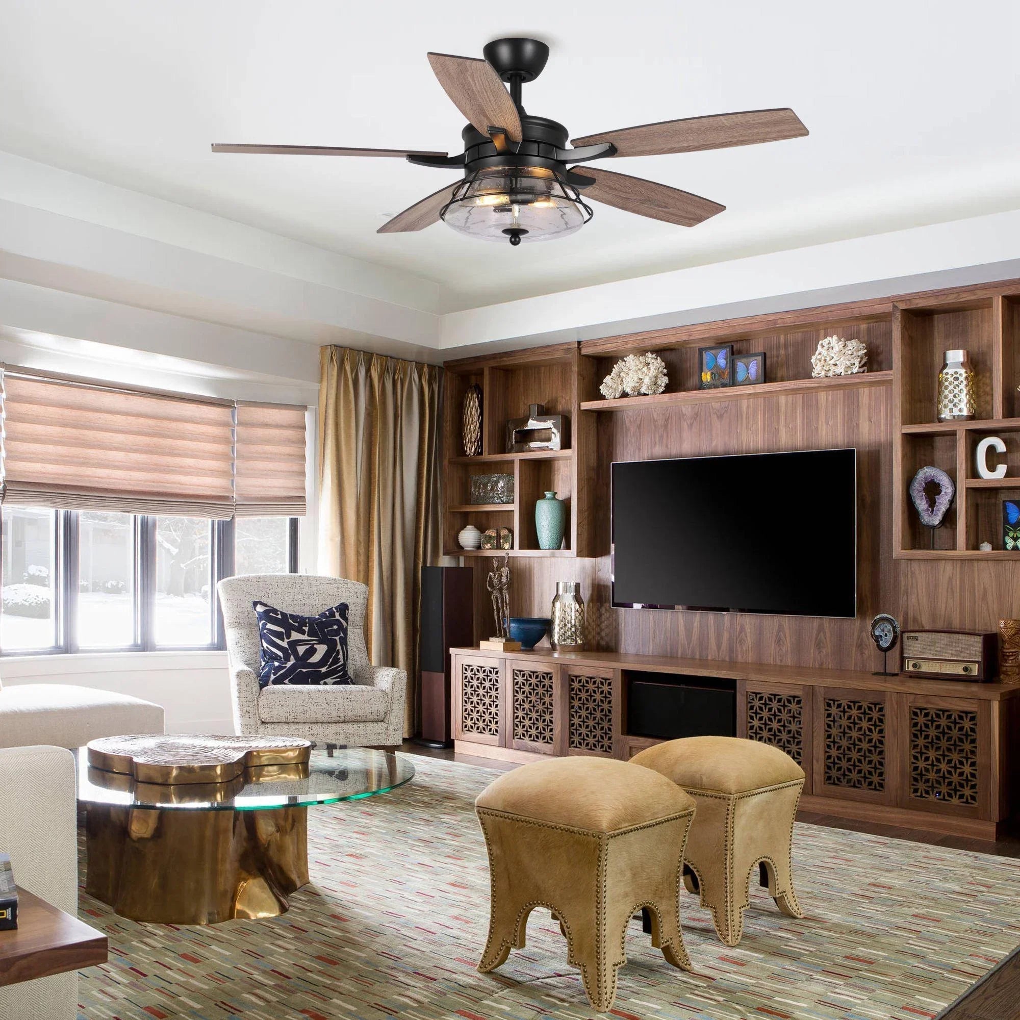 Black ceiling fan with wood blades and clear glass light fixture
