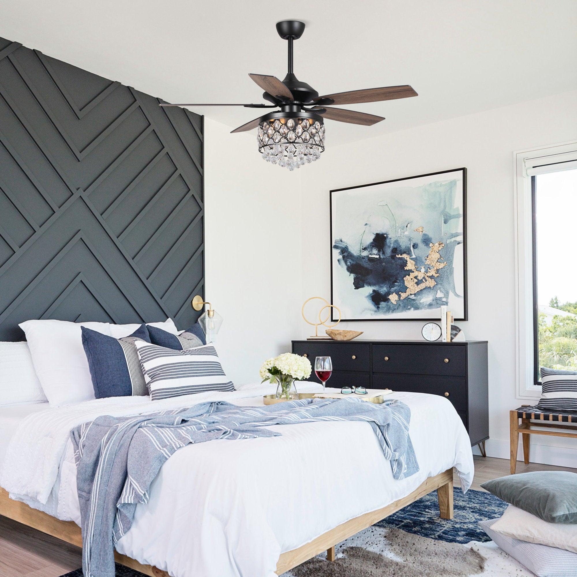 Black ceiling fan with crystal light fixture and wood-look reversible blades