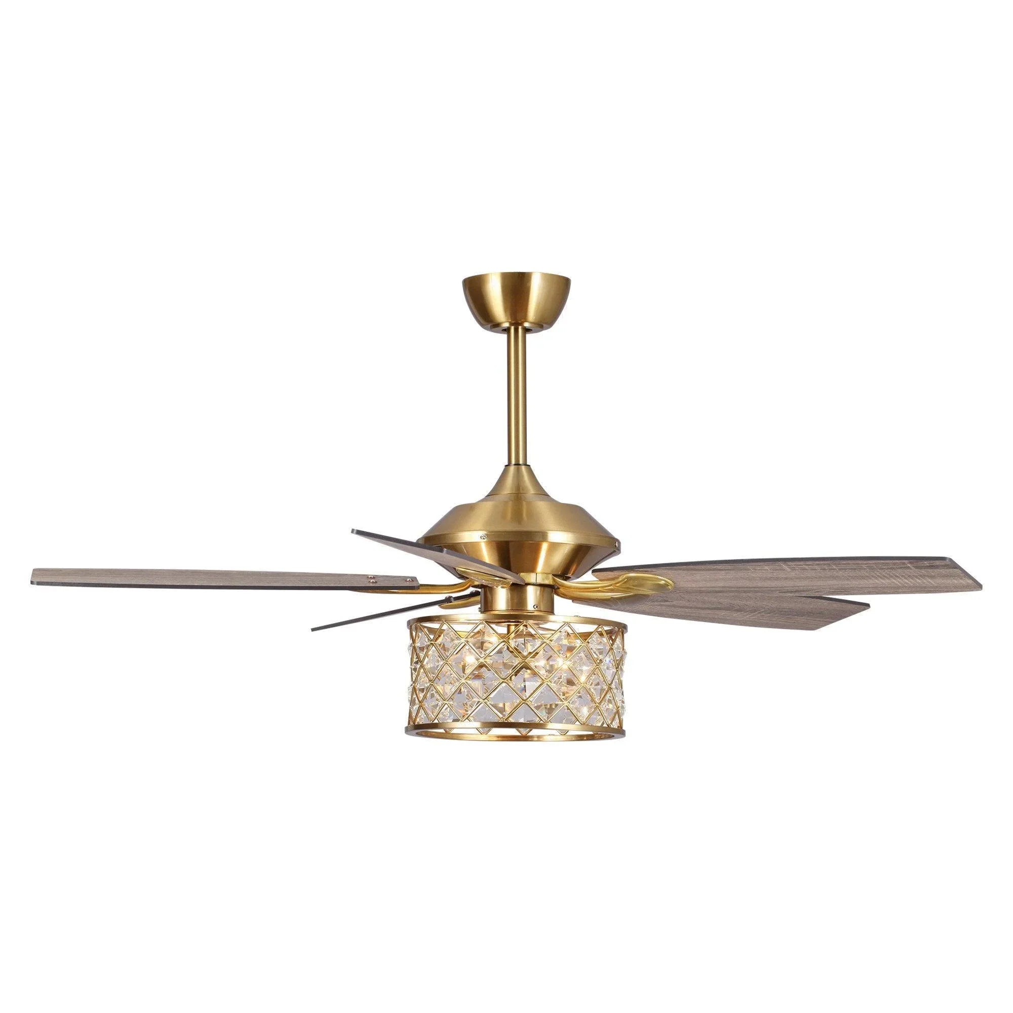 Golden ceiling fan with crystal light housing and five dark wood blades