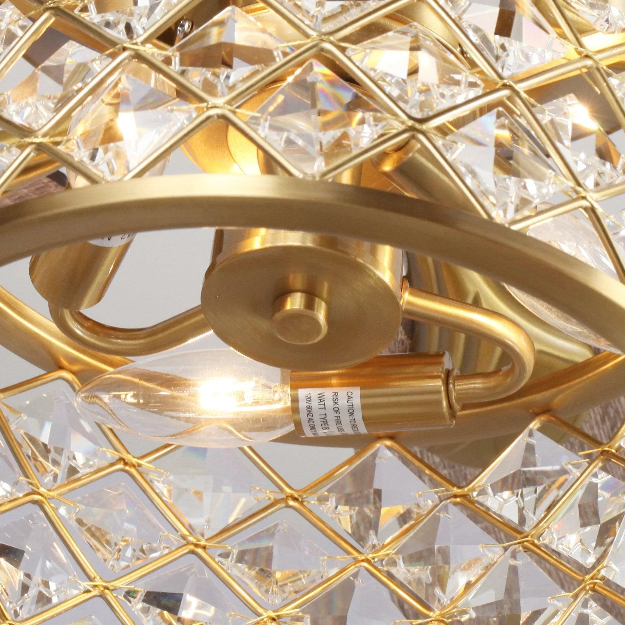 Gold crystal light fixture with diamond lattice frame