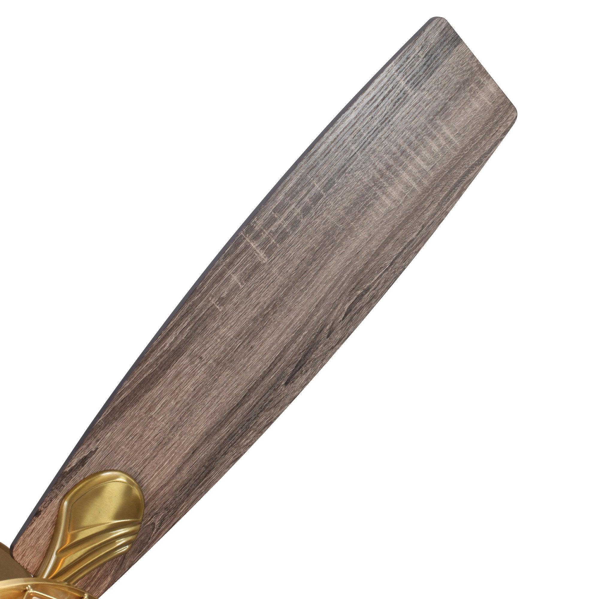 Reversible ceiling fan blade with warm dark wood finish and golden mounting hub