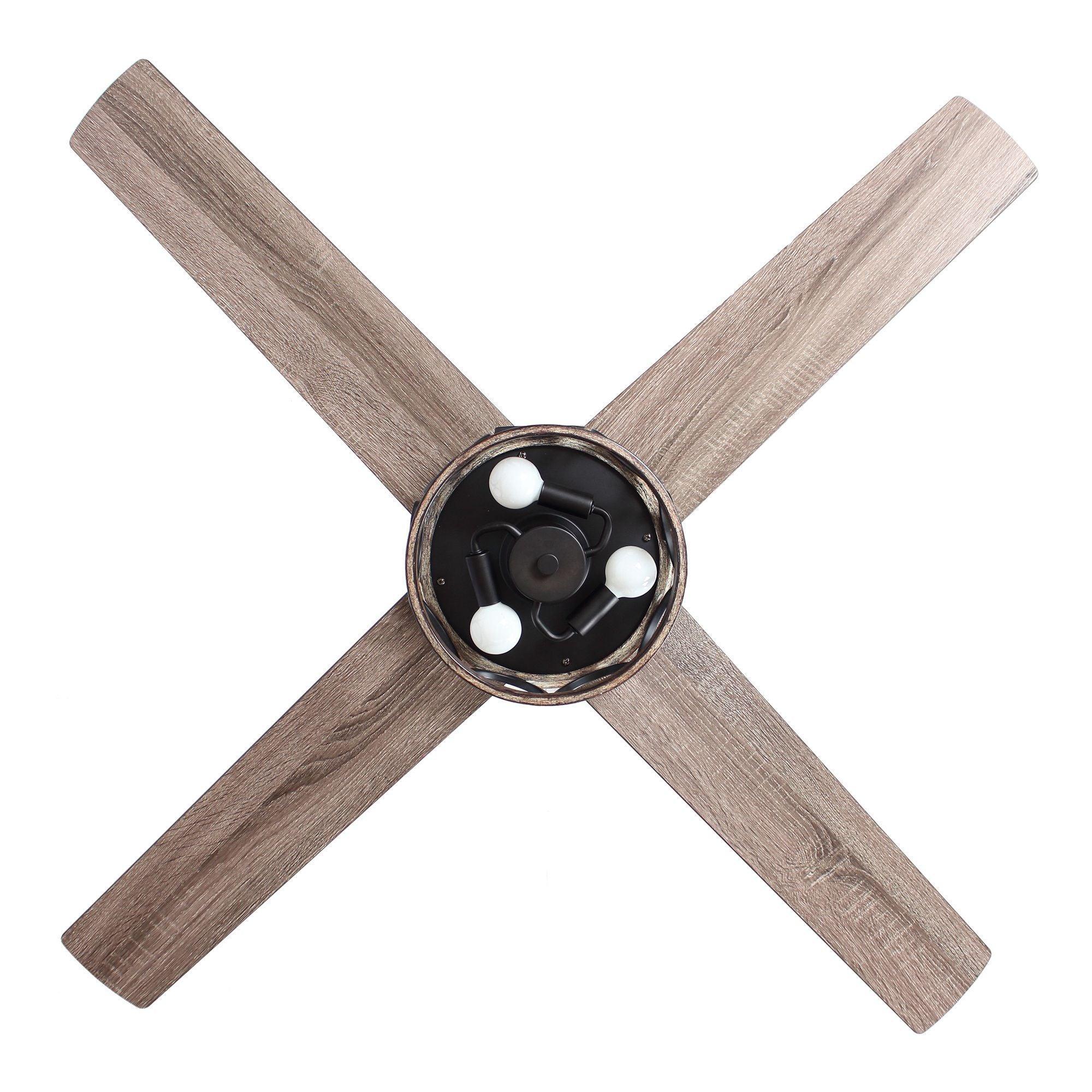 Ceiling fan underside with four wood blades and central lantern light housing.