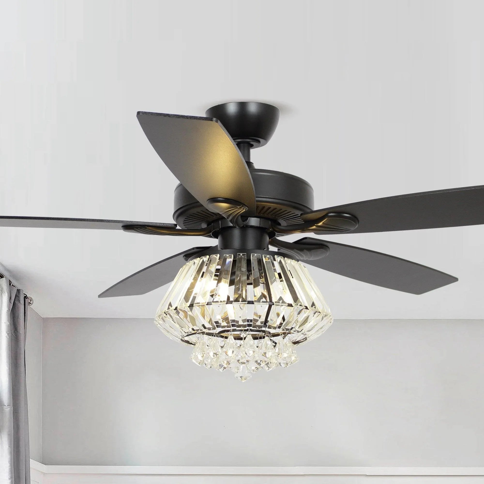 Black ceiling fan with reversible blades and crystal glass light fixture