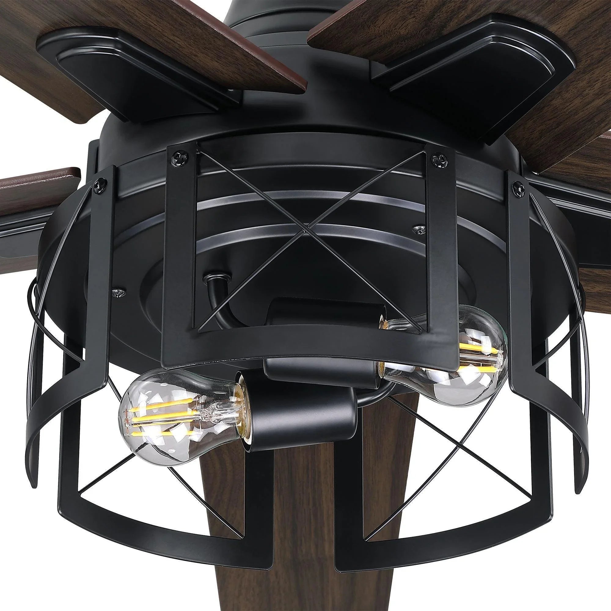 Close-up of black lantern light cage and dark wood ceiling fan blades