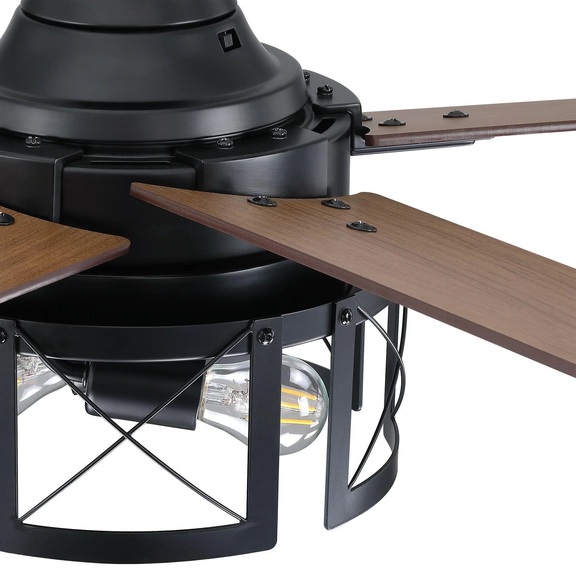 Black ceiling fan motor housing with lantern light and dark wood blade