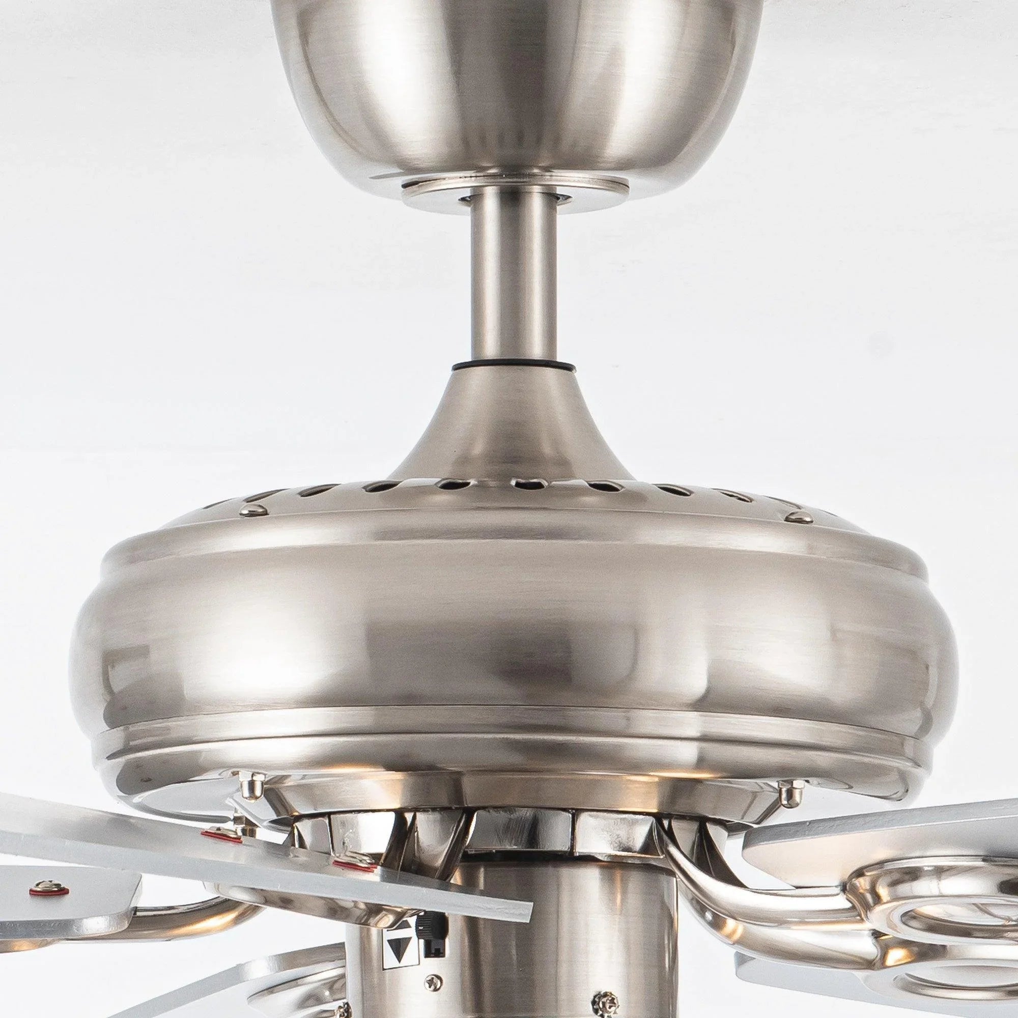 Brushed nickel downrod and fan canopy with fluted motor housing and mounting points