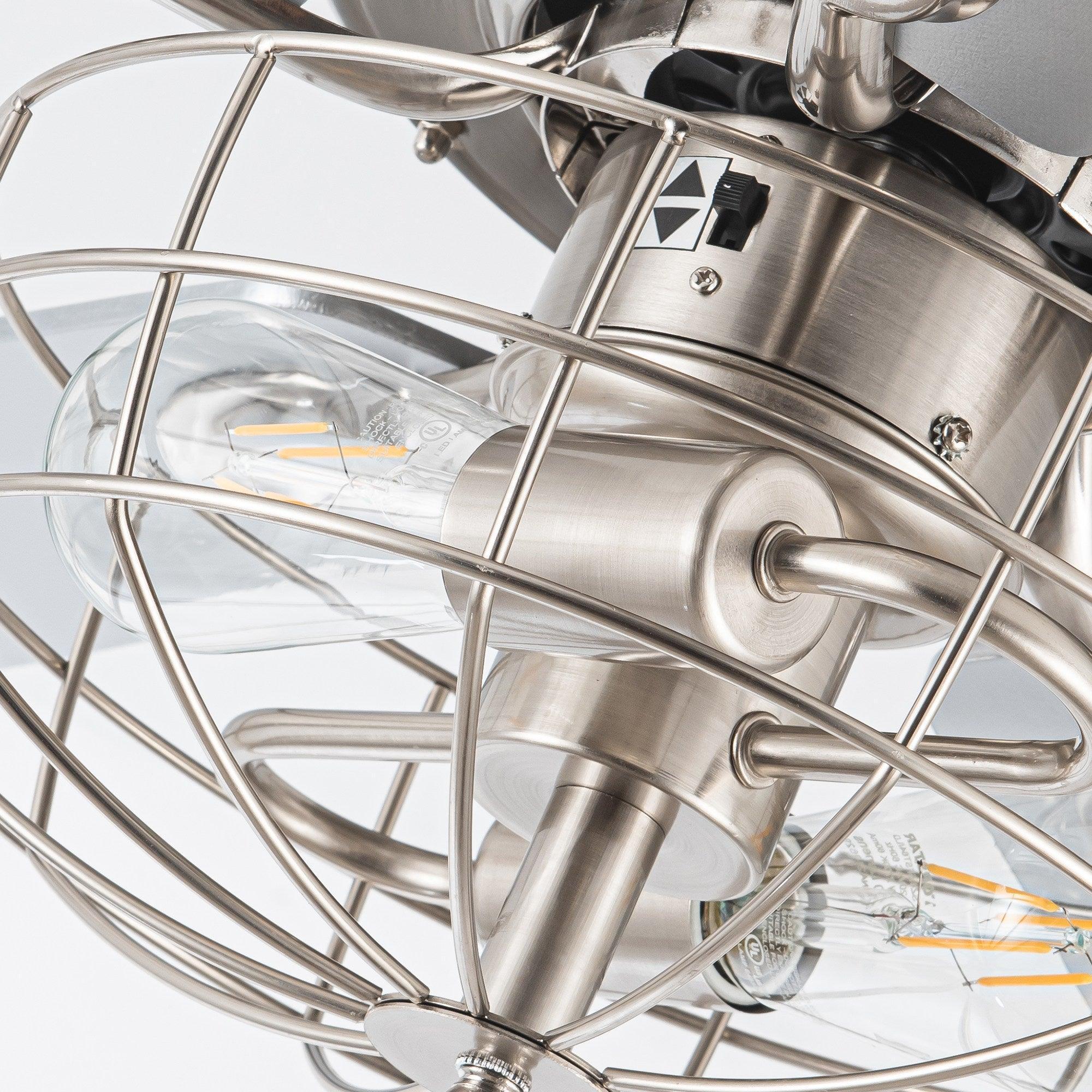 Brushed nickel caged light assembly with clear glass bulbs and metal guard around