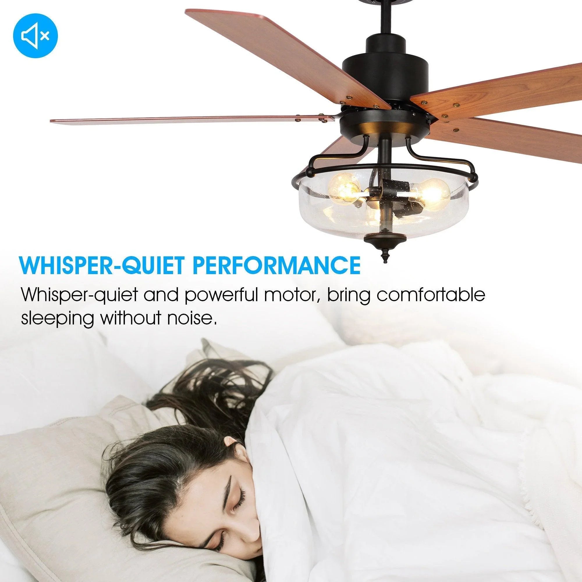 Ceiling fan with black housing, reversible wood blades, and frosted glass globe light