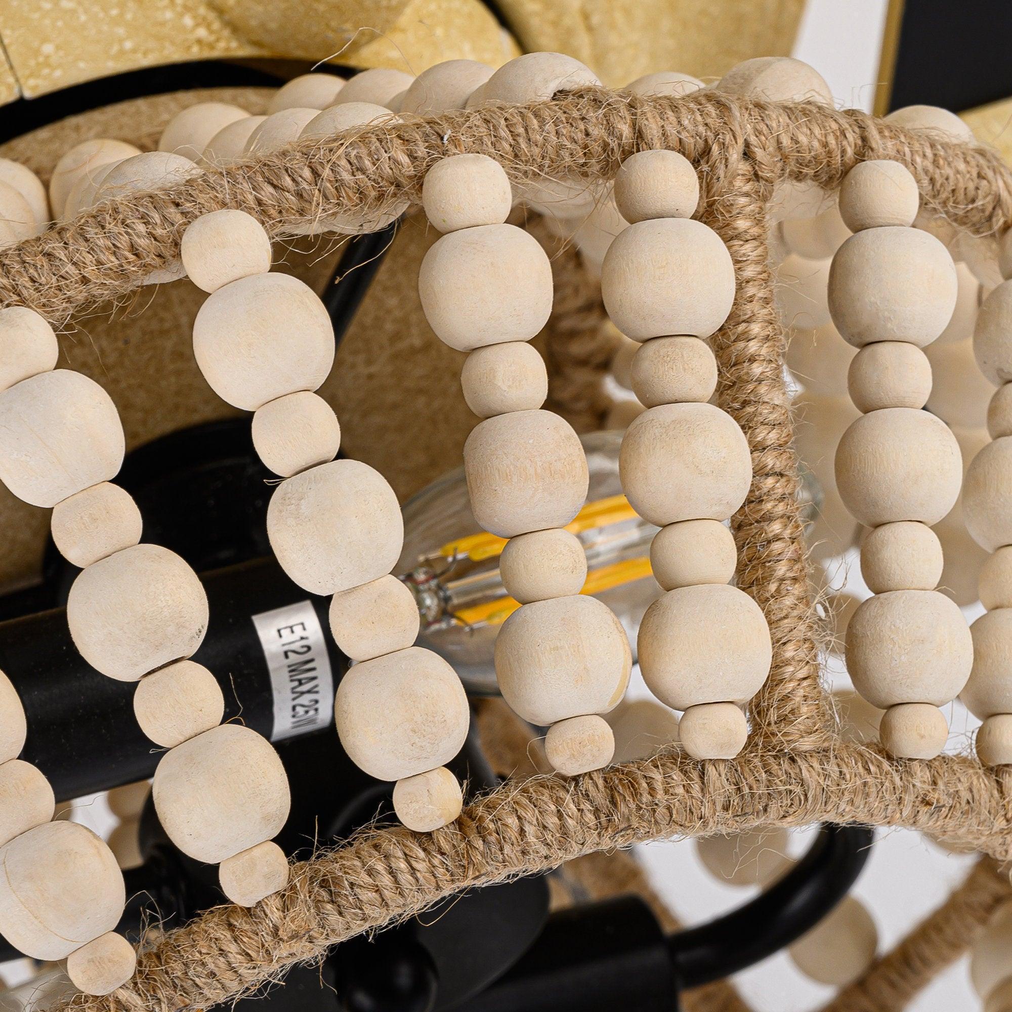 Close-up of farmhouse ceiling fan light cage with round bead accents