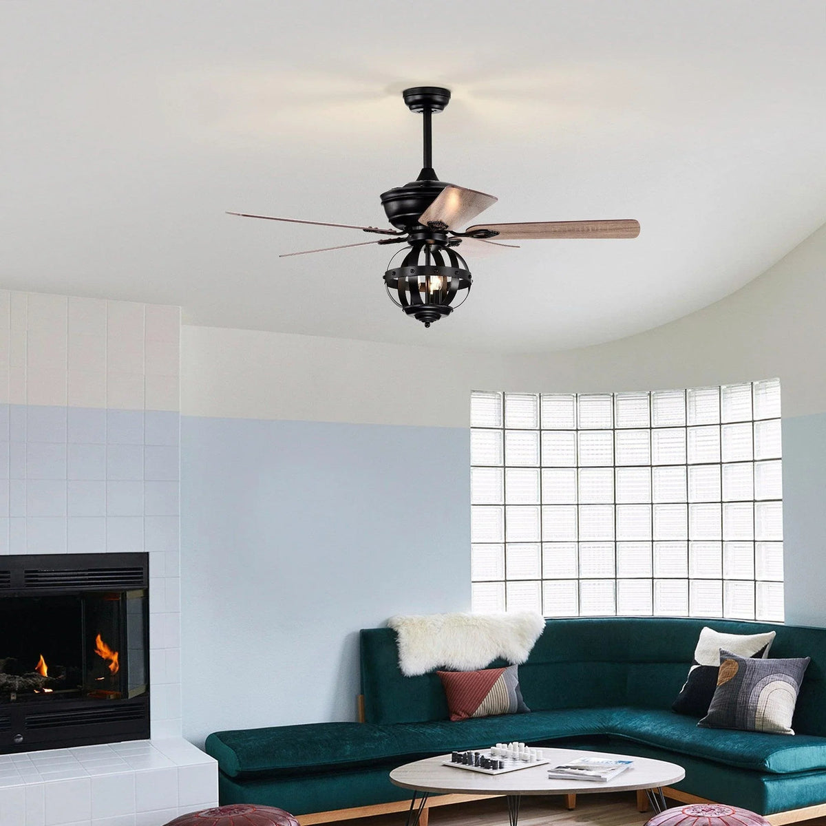Black ceiling fan with lantern-style light globe and wood-toned reversible blades