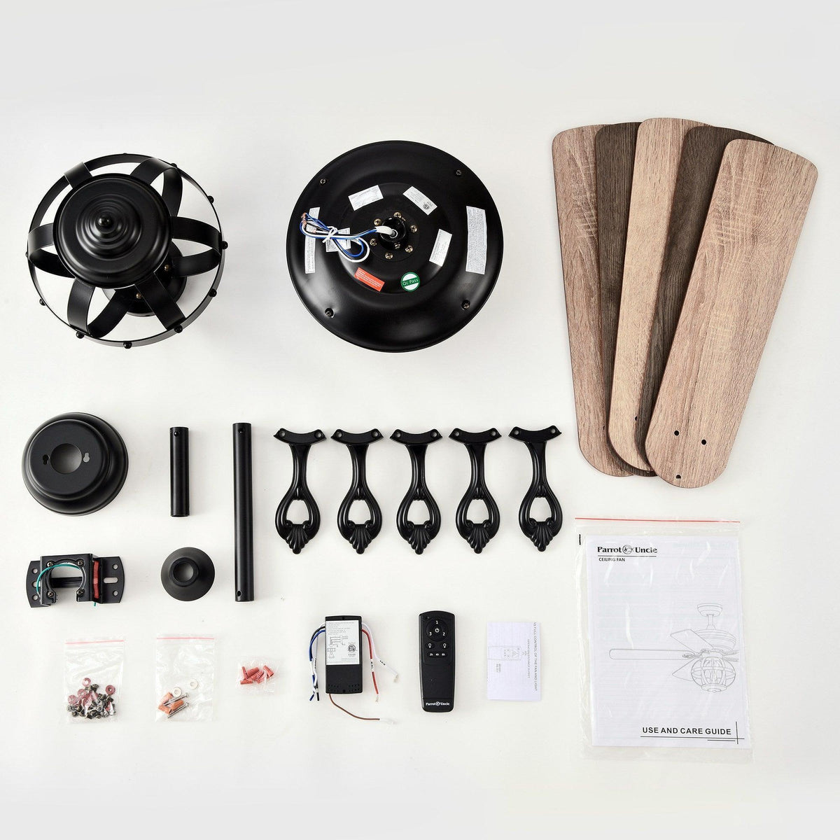 Ceiling fan remote, fan blades, and light kit components on a white parts layout