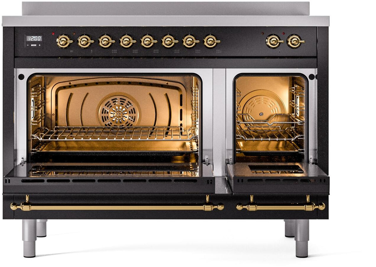 Freestanding electric induction range with oven doors open and brass interior trim