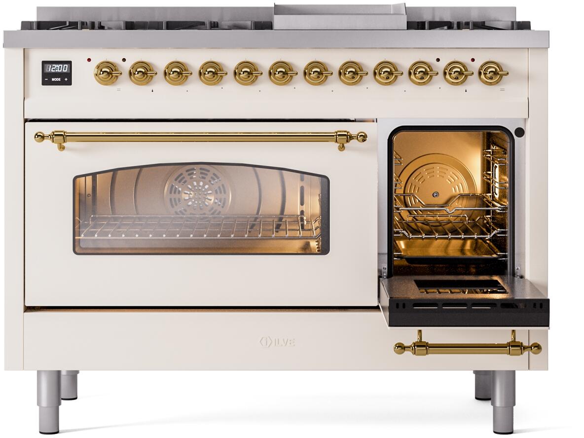 Dual fuel range with oven glass door open and side compartment open