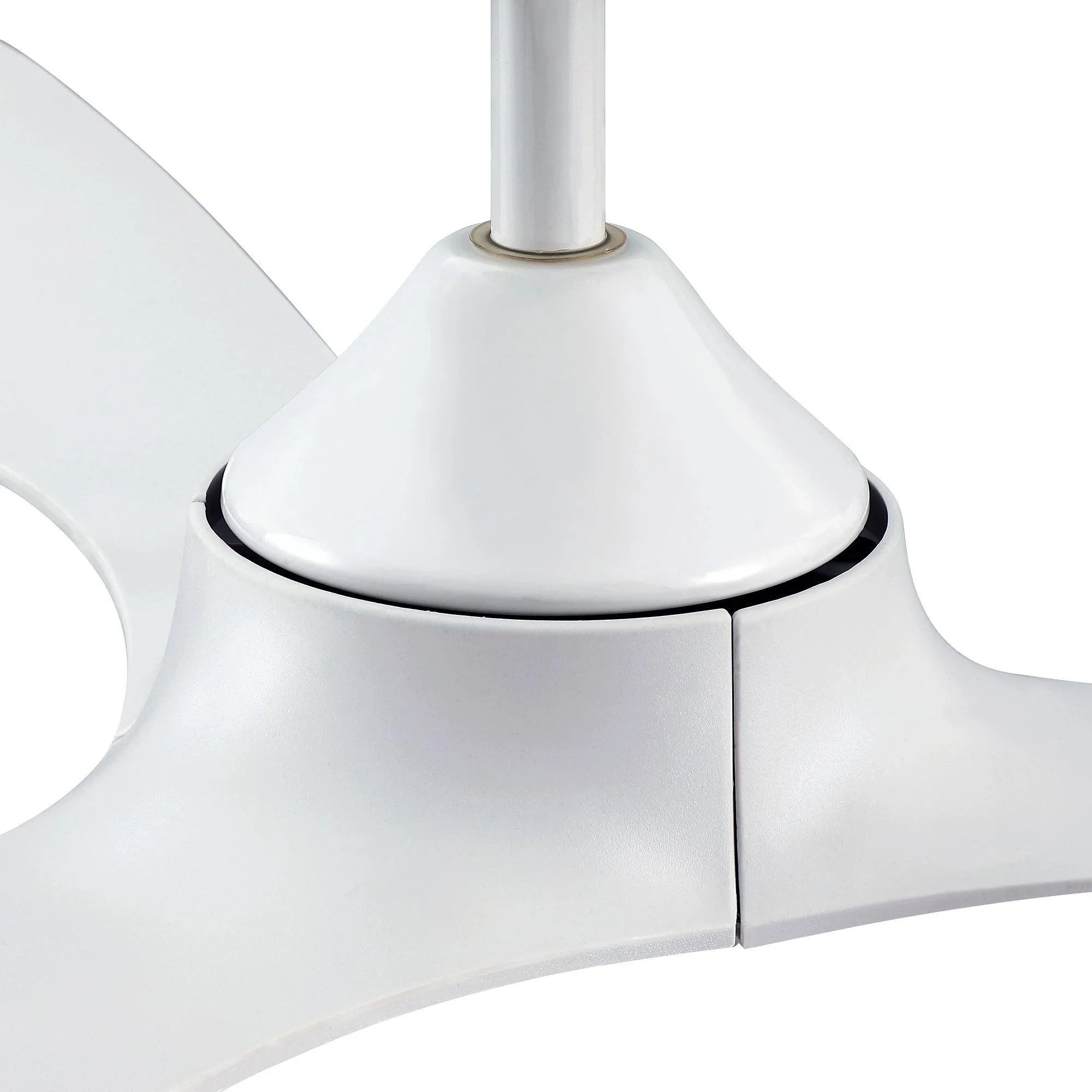 White ceiling fan motor housing and blade hub close-up