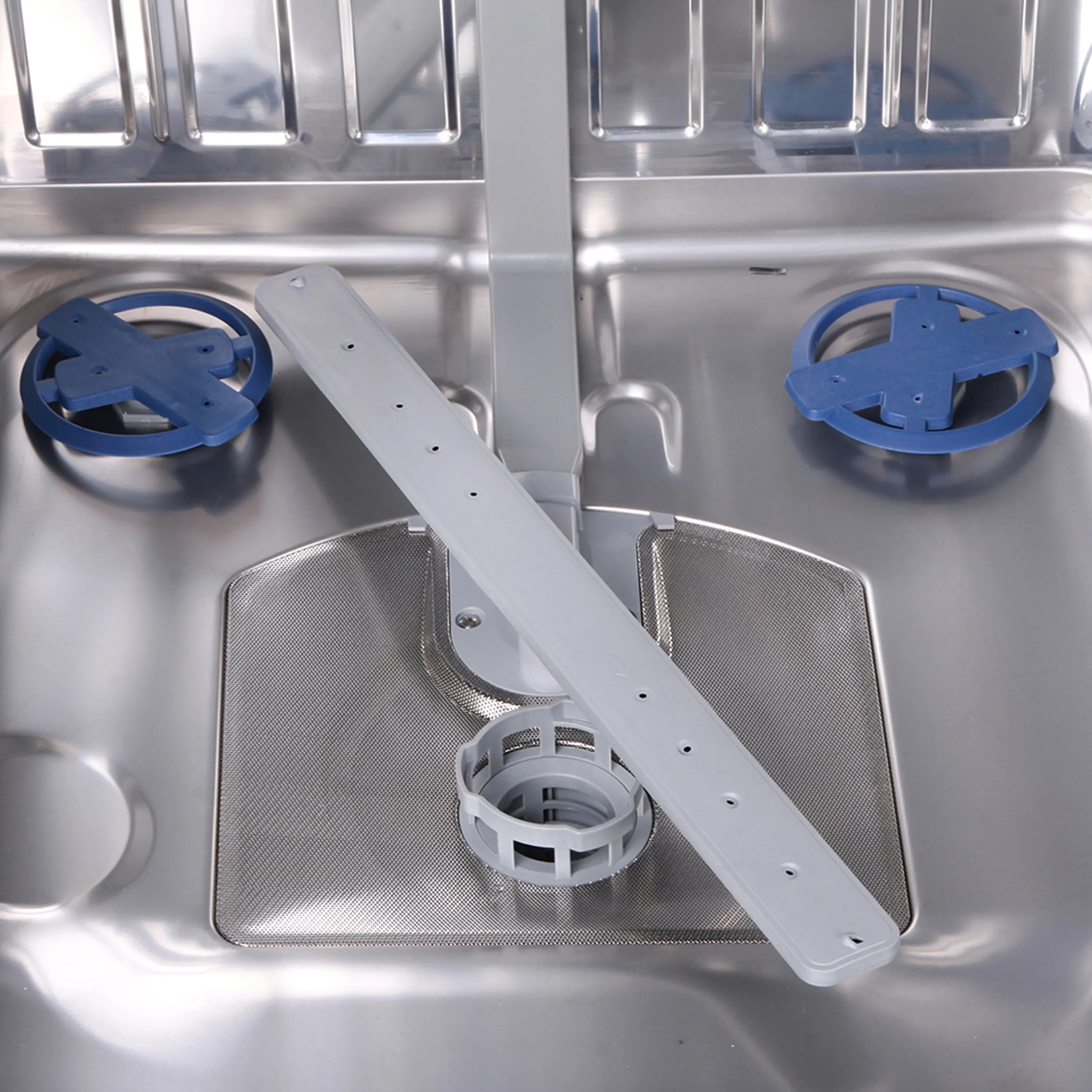 Kostch dishwasher interior with two blue circular spray arms and racks