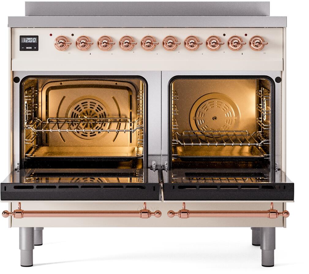 Freestanding induction range with two open oven doors, antique white body and copper trim