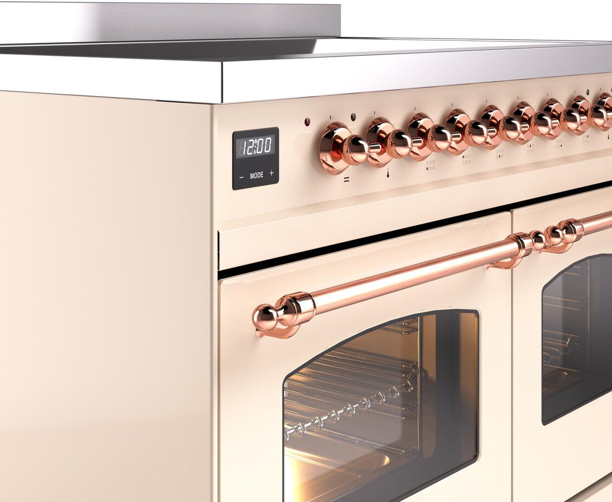 Freestanding induction range control panel with copper knobs and long copper bar handle across oven door