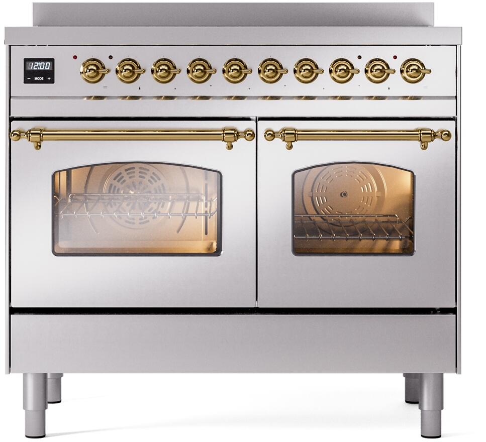 Stainless induction range with brass-trim control knobs and two oven doors, front view