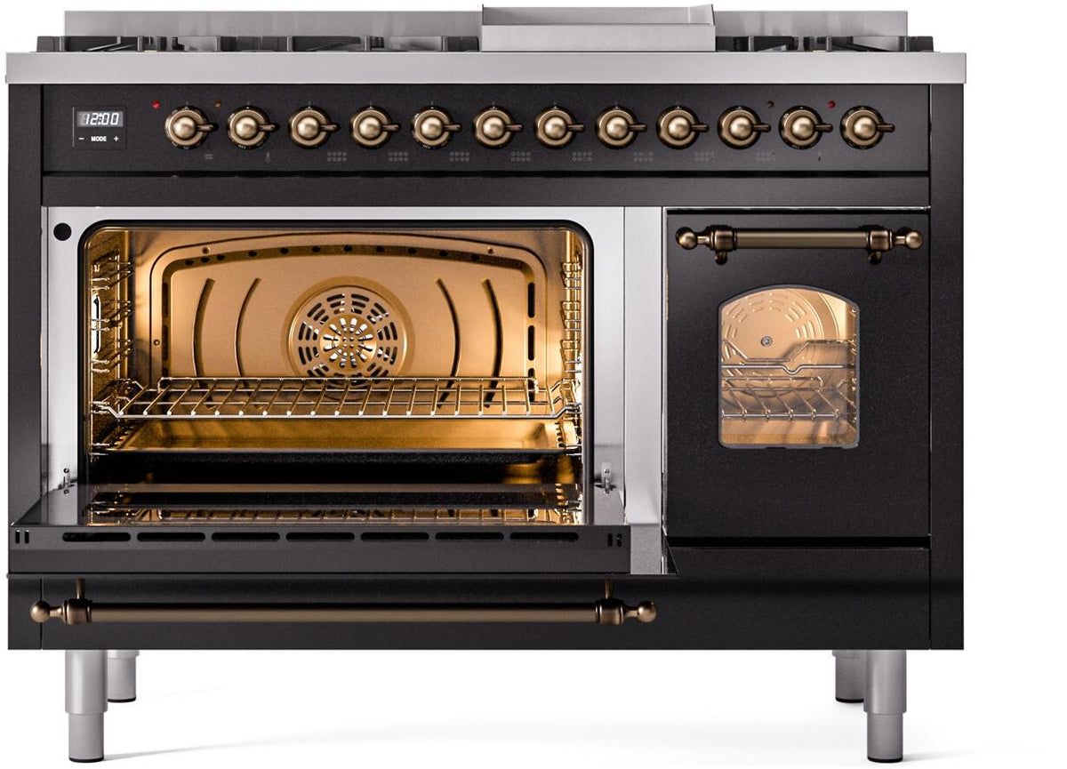 Freestanding dual fuel range with left and right oven interiors lit, glossy black
