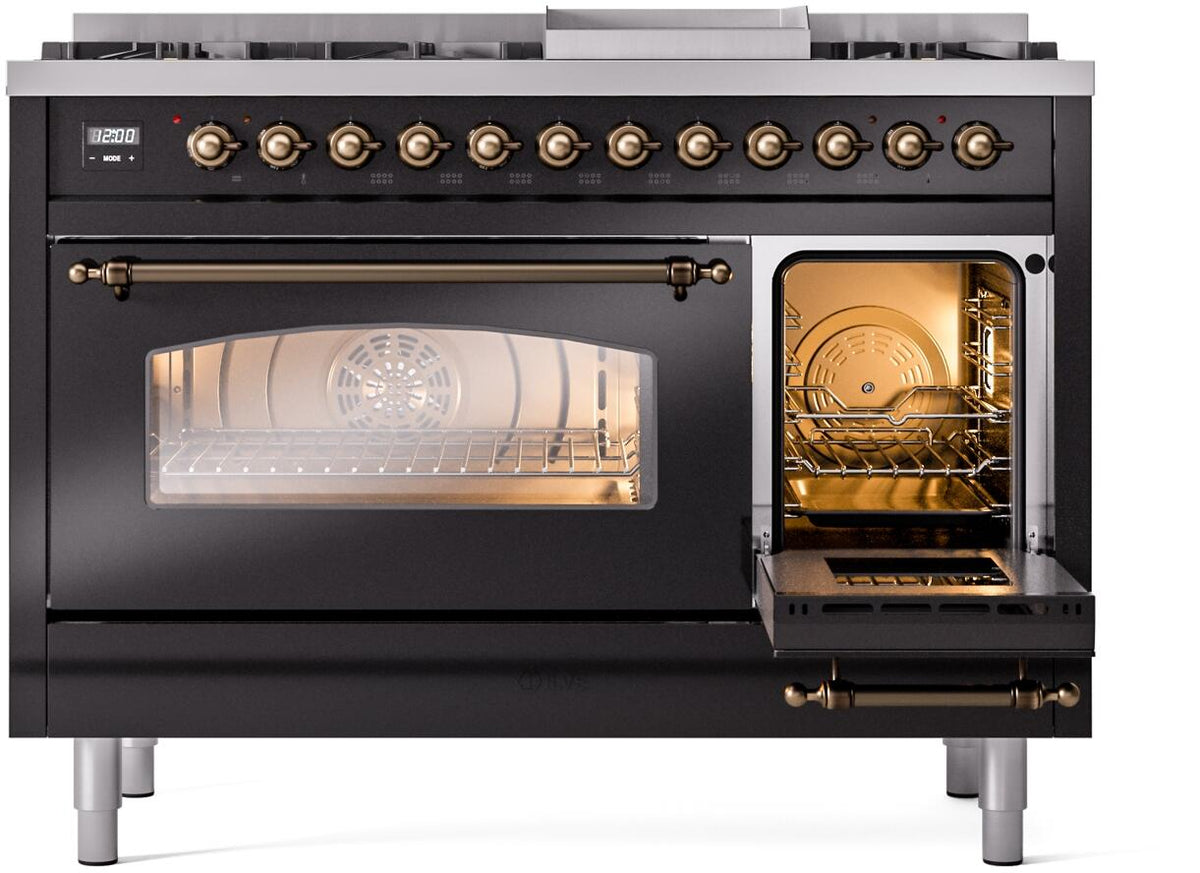 Glossy black range with one oven door open, lit interior, and bronze trim accents