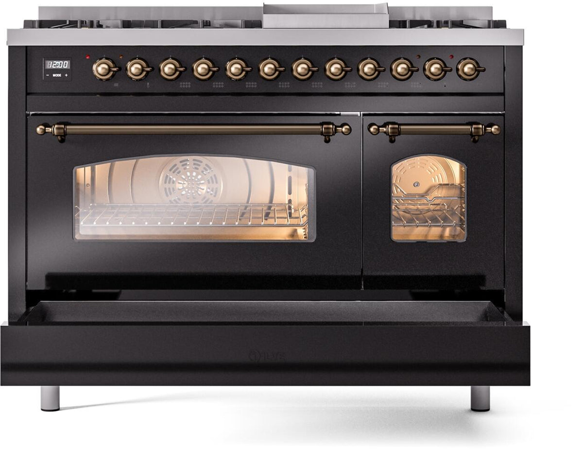 Freestanding dual fuel range with oven doors open and warming compartment door closed