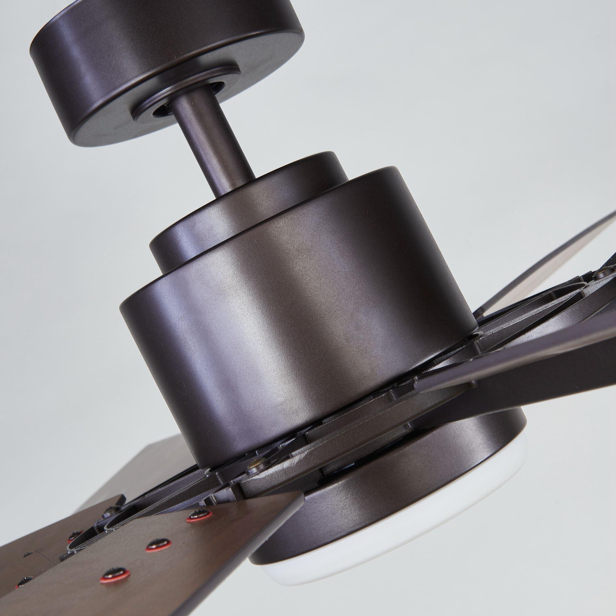 Oil-rubbed bronze windmill ceiling fan motor housing with frosted LED light and blades