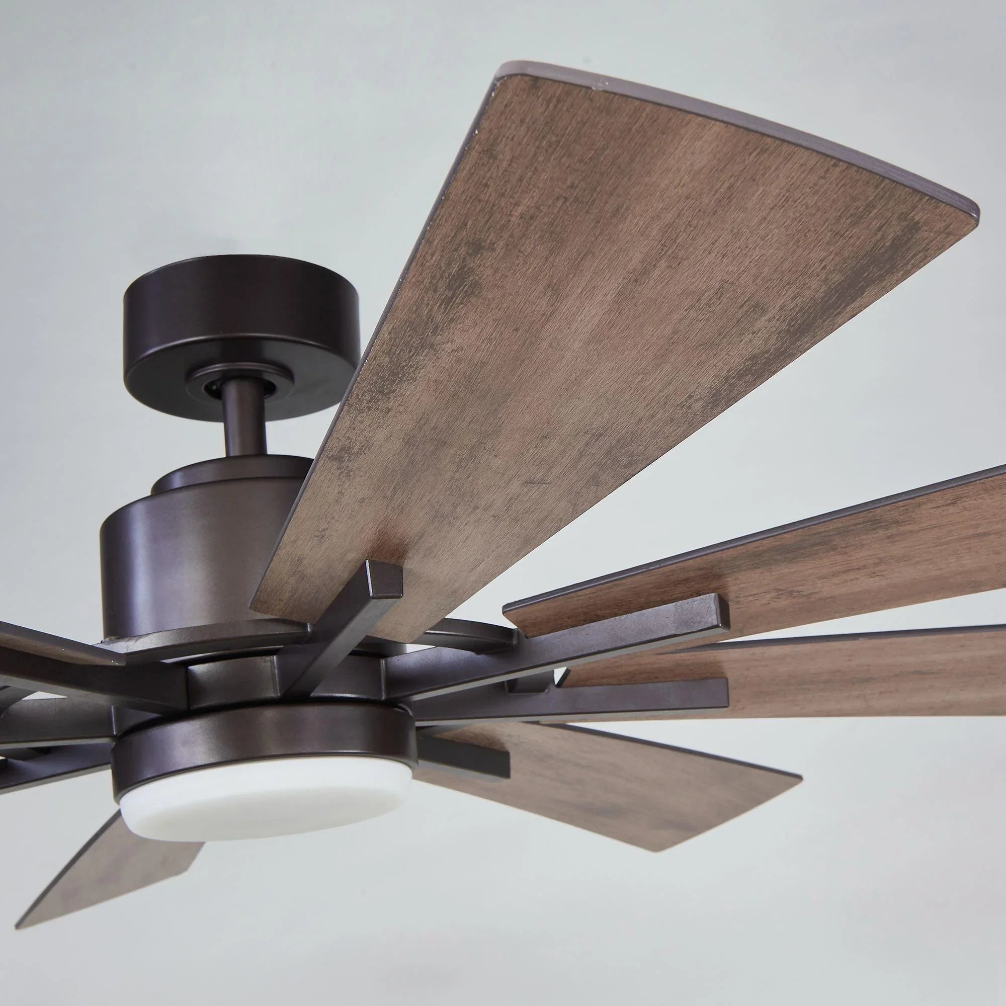 Oil-rubbed bronze windmill ceiling fan, five wood blades and frosted LED light, close view