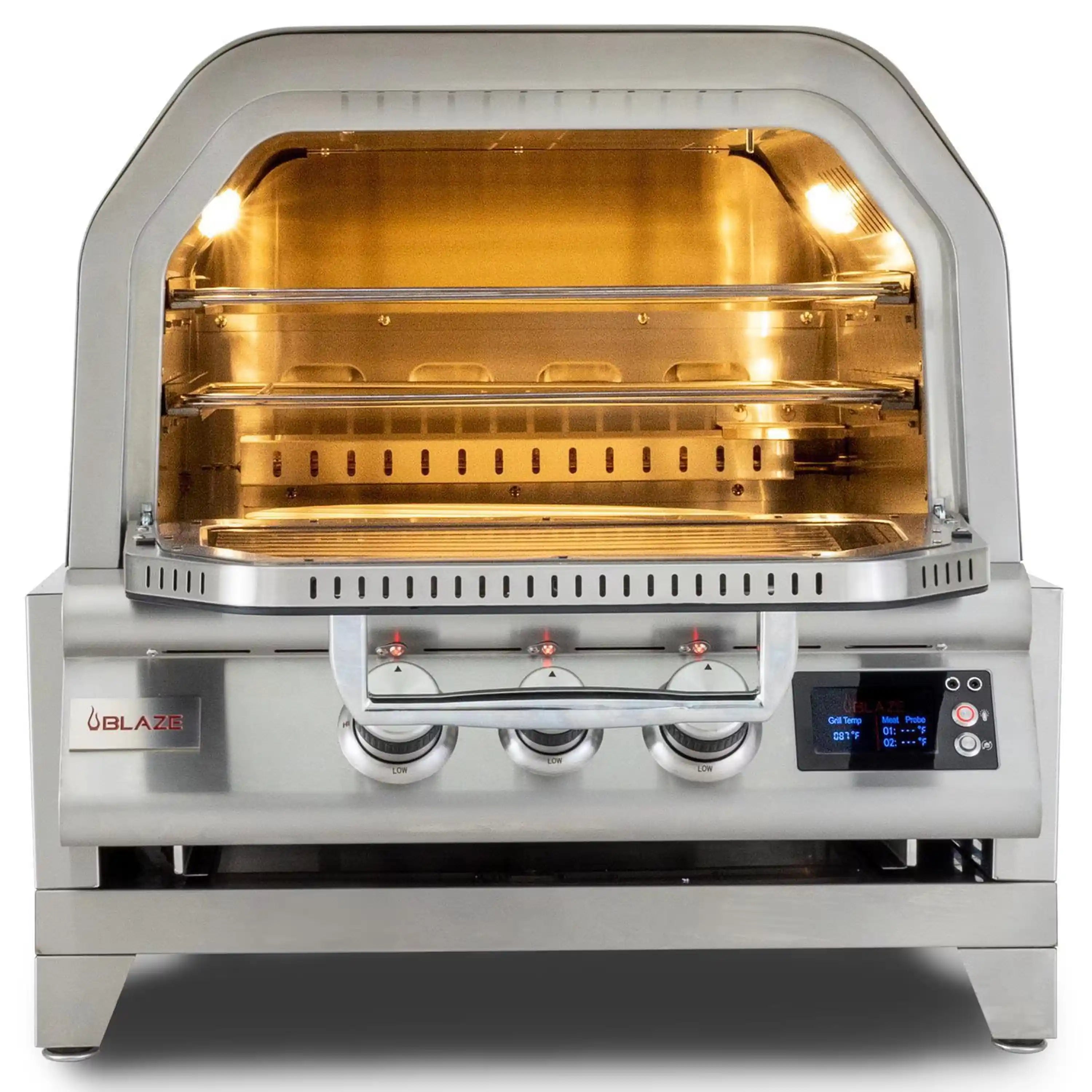 Front view of stainless countertop pizza oven with glowing interior and three burner knobs