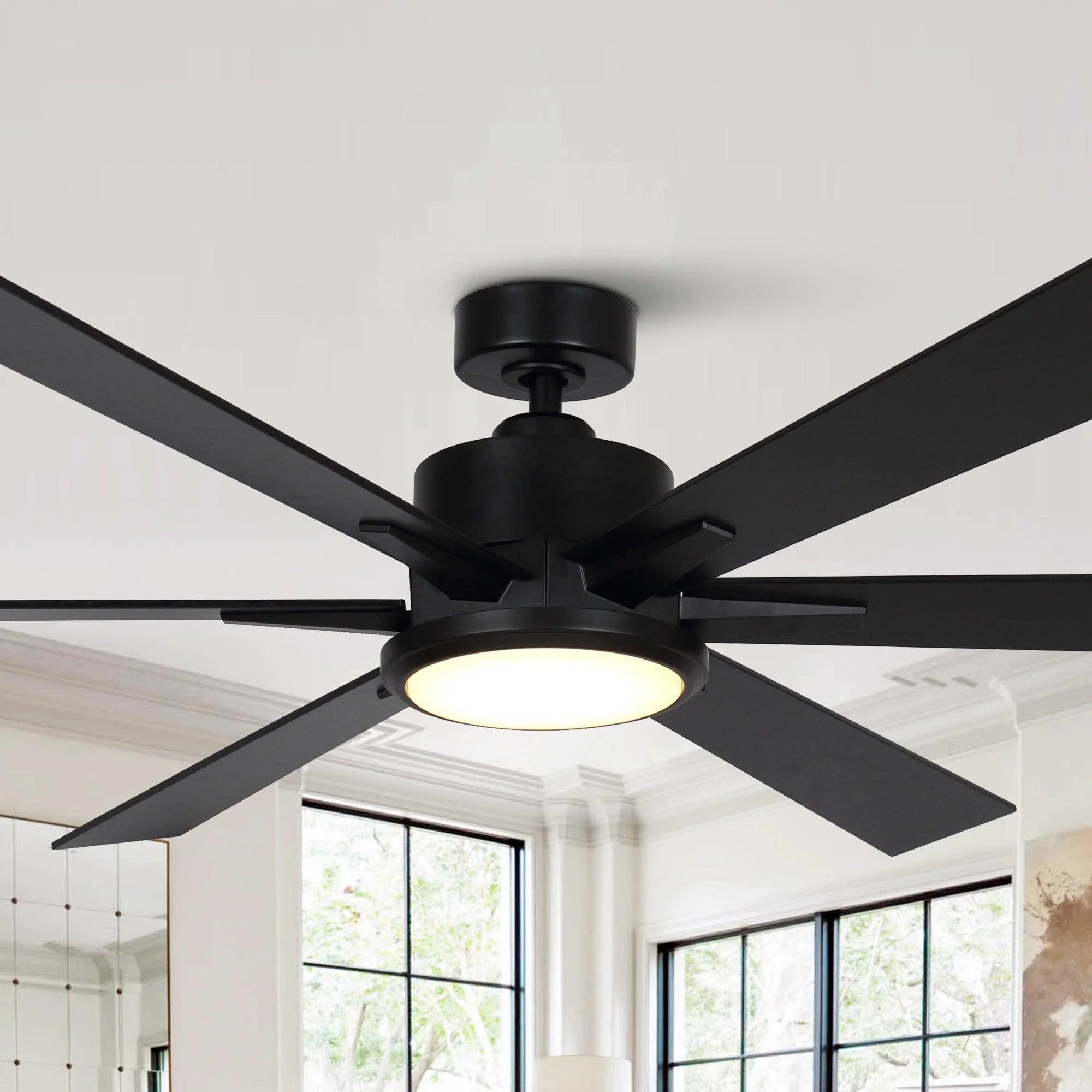 Black ceiling fan with five blades and flush-mounted integrated light fixture