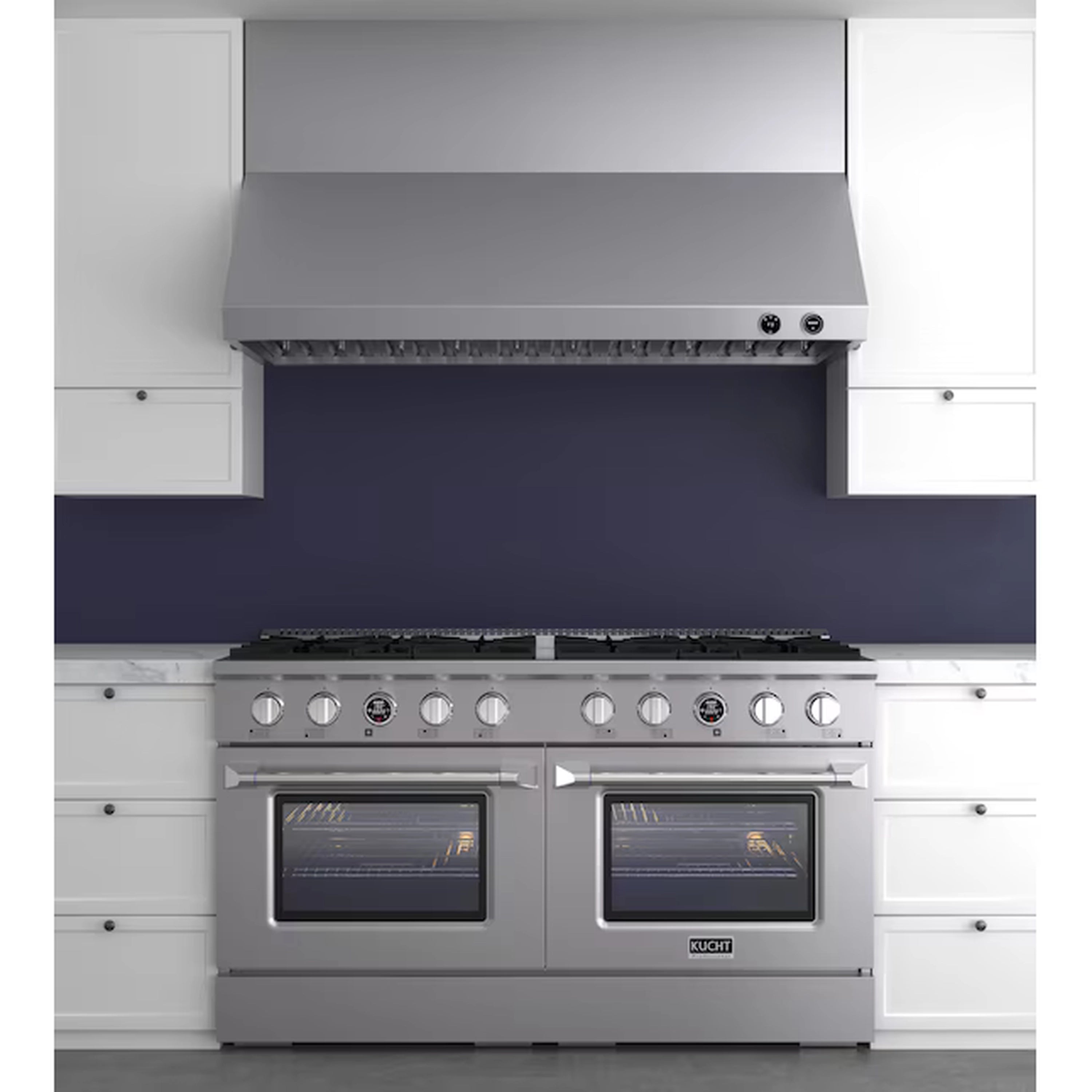 Stainless steel under-cabinet range hood installed over a gas cooktop