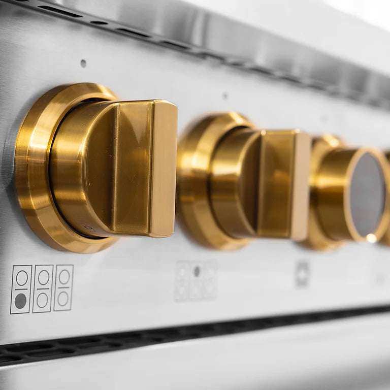 Stainless steel dual fuel range with gold control knobs and digital display panel