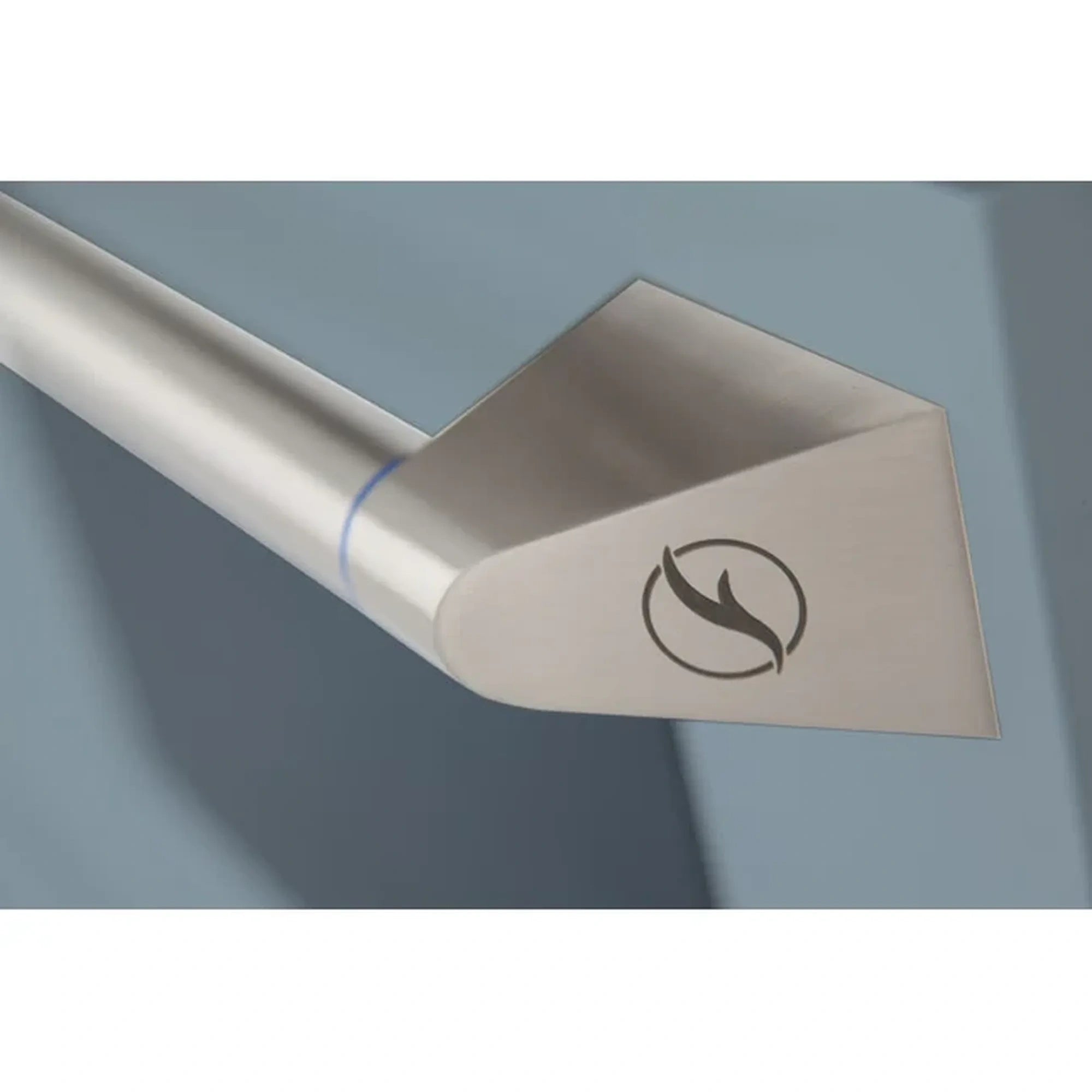 Light blue oven door handle with flame-style emblem on a gas range