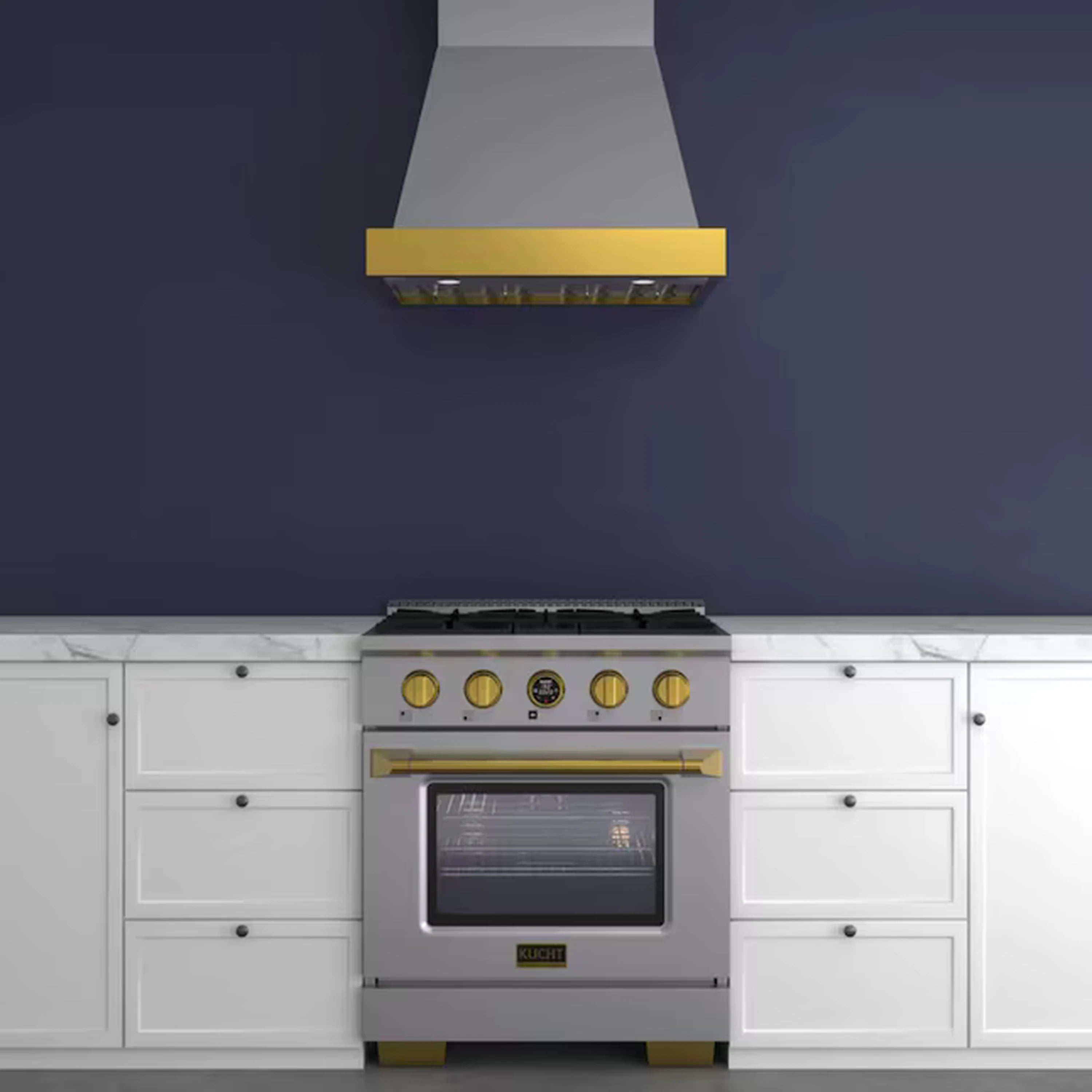 Stainless steel ducted range hood above cooktop with gold control strip and vent openings