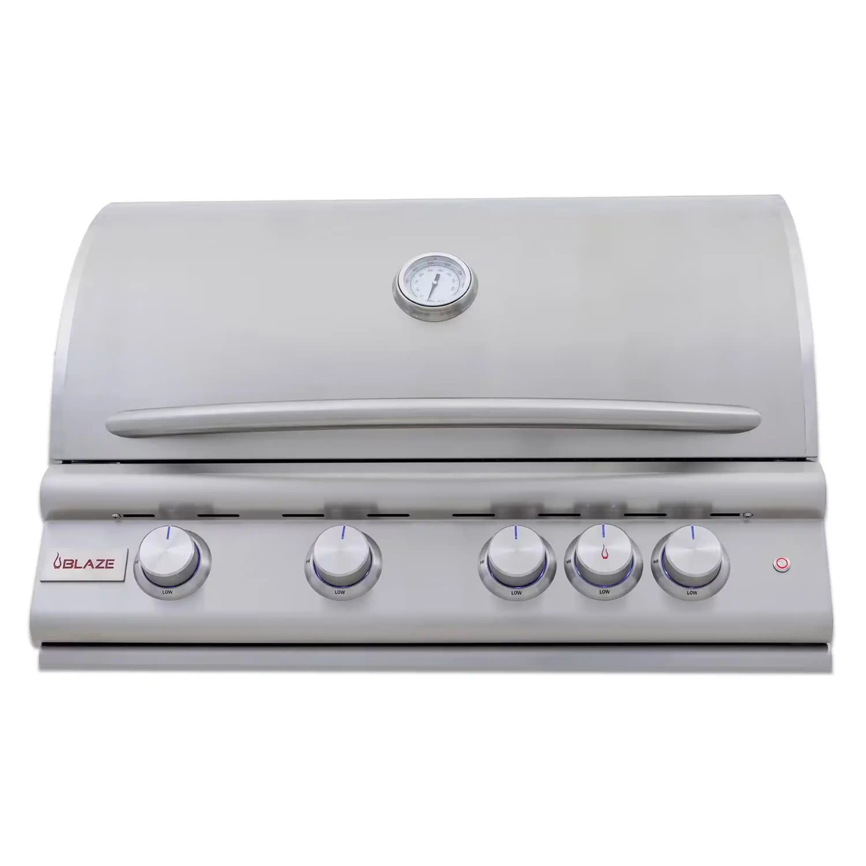 Stainless and white gas grill with closed hood, control knobs, and temperature gauge