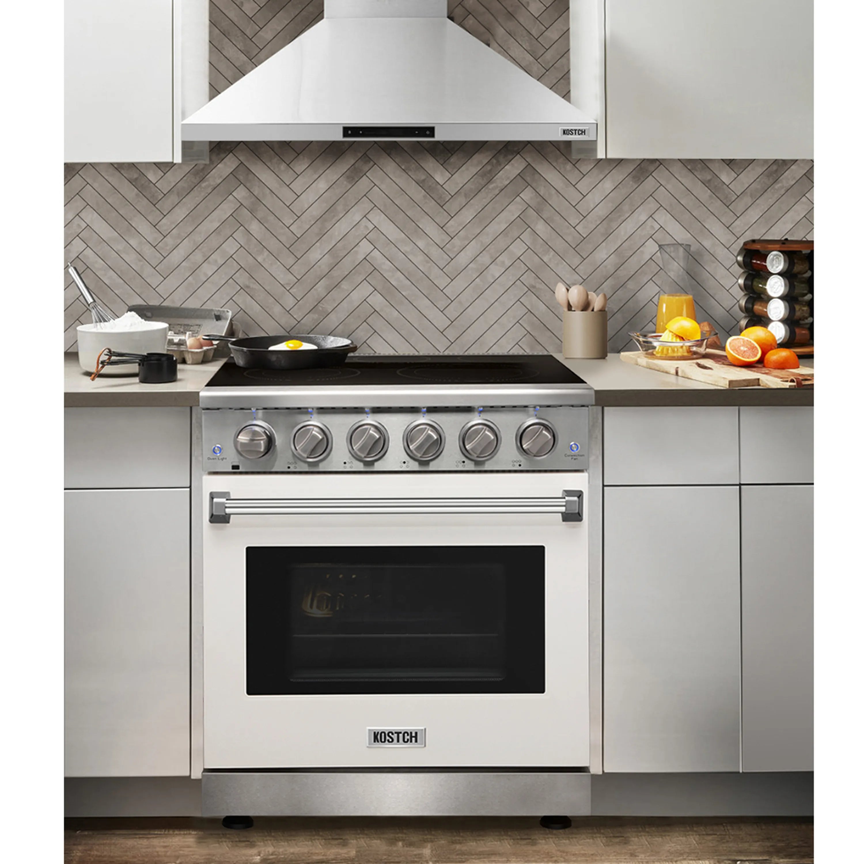 White electric range with black glass cooktop and convection oven window, stainless handle.