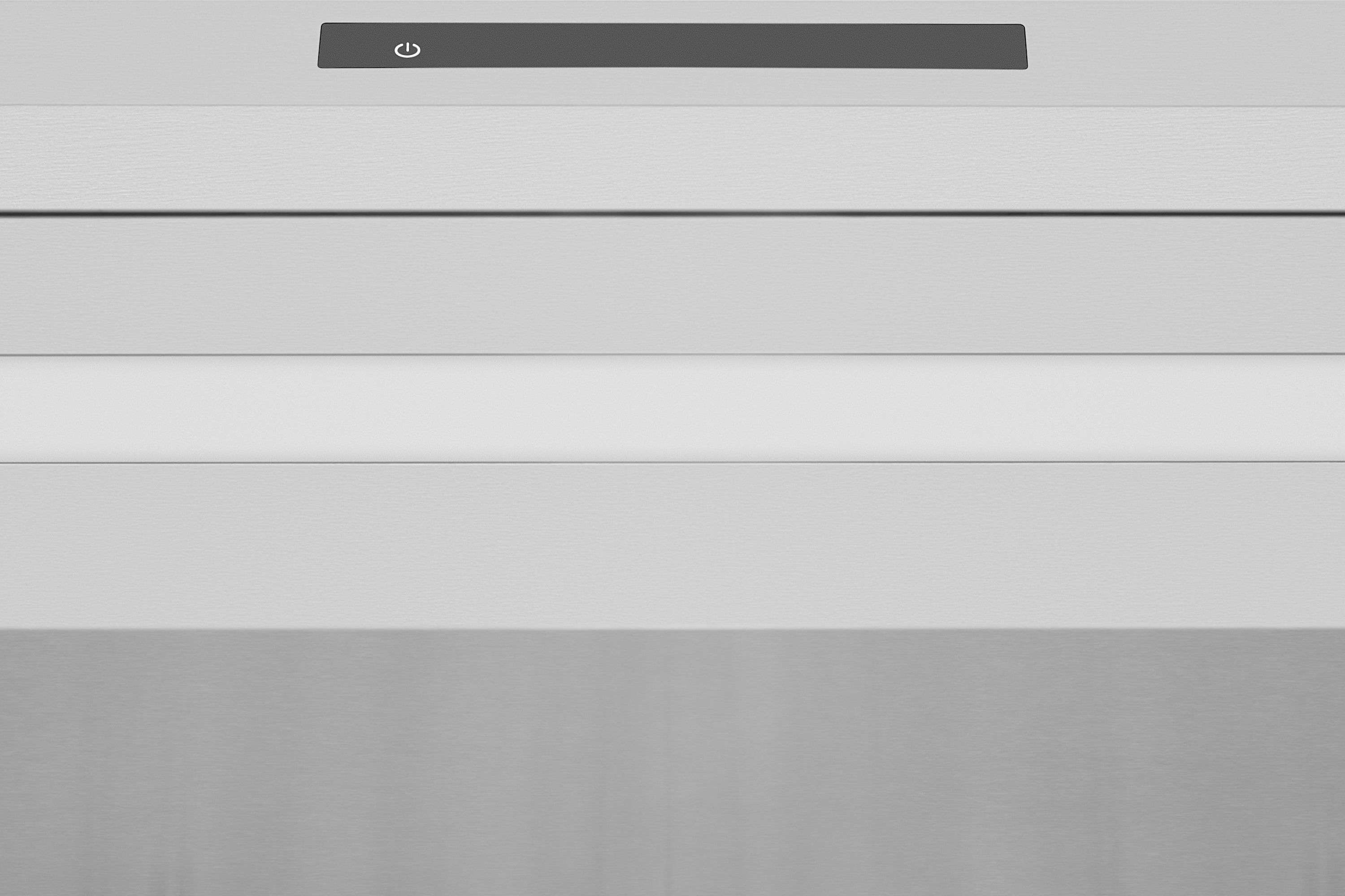Stainless steel range hood underside showing slim control strip