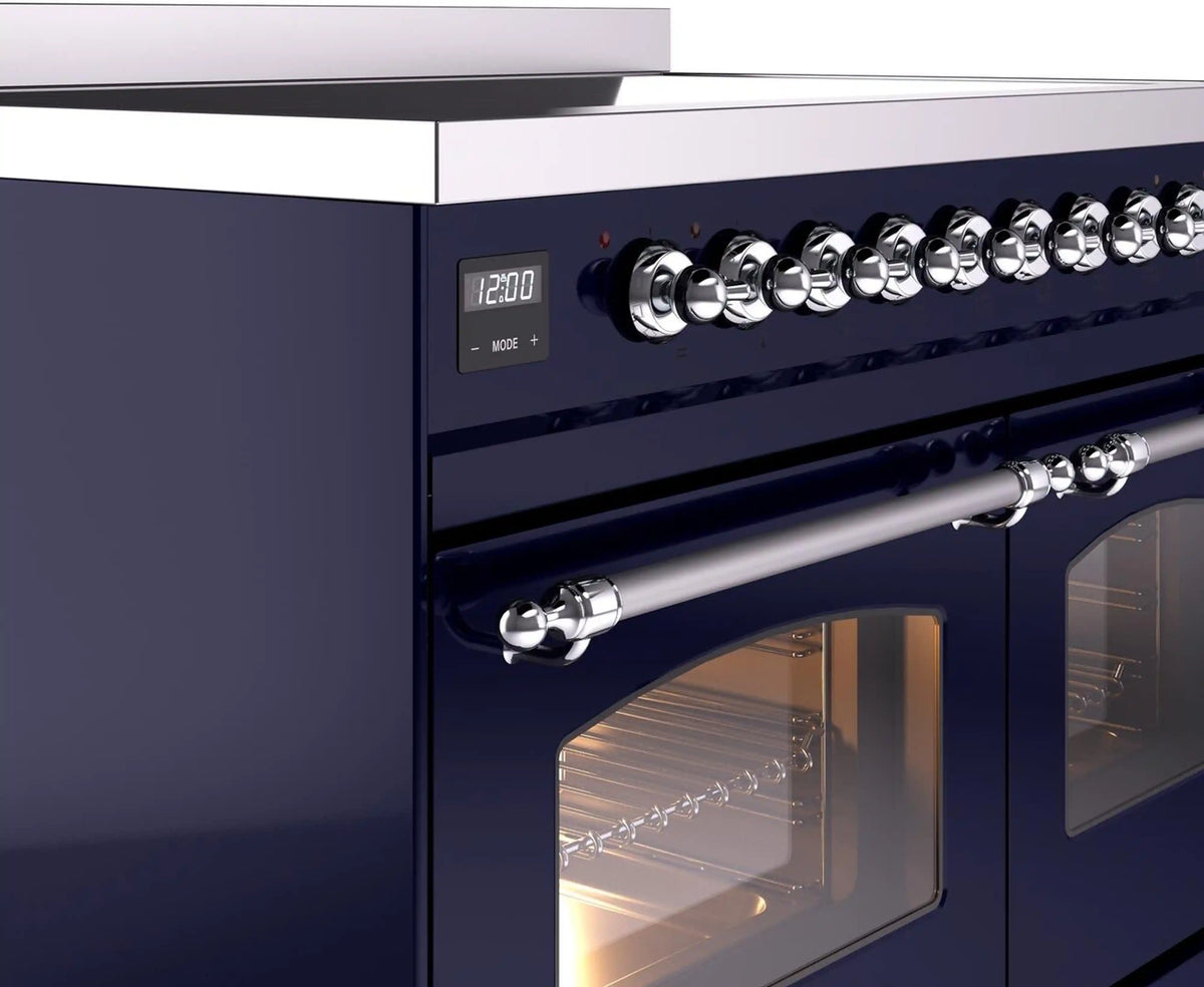 Midnight blue control panel with chrome knobs and oven handle on freestanding range