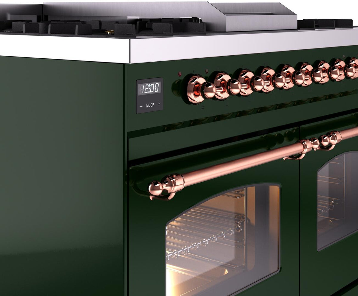 Dual fuel range control panel with emerald green face and copper knobs plus back burners.