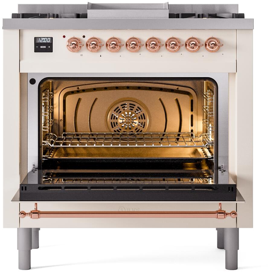Antique white dual fuel range with oven door open, showing lit interior racks