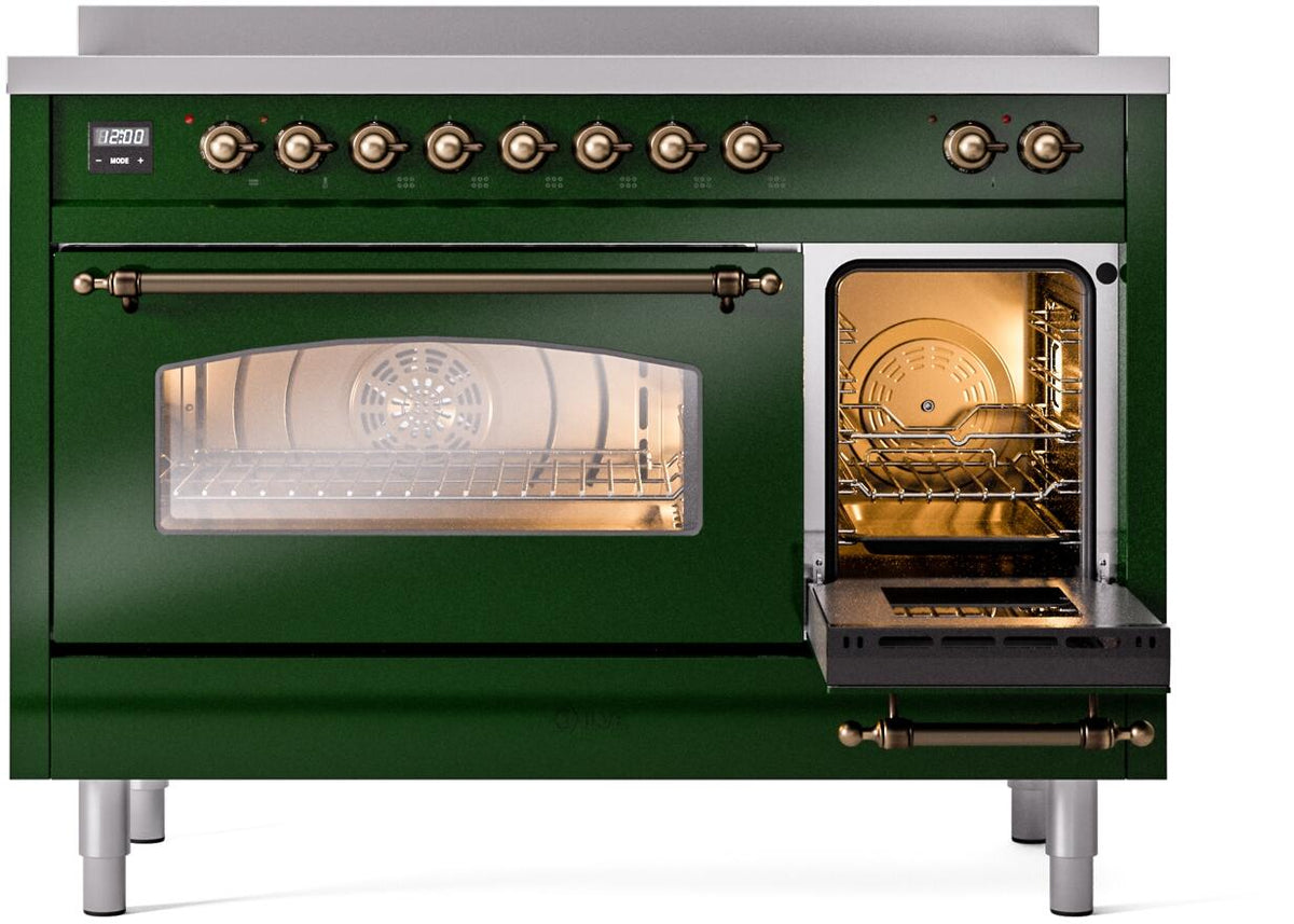 Emerald green induction range with oven door ajar and illuminated interior