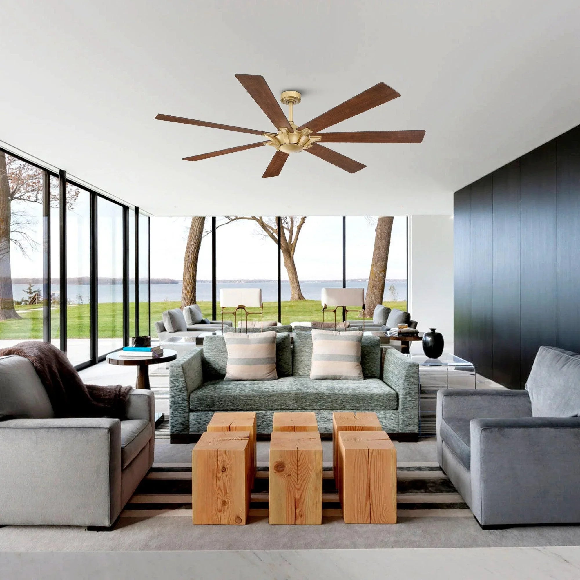 Golden ceiling fan with five wood blades in a living room setting