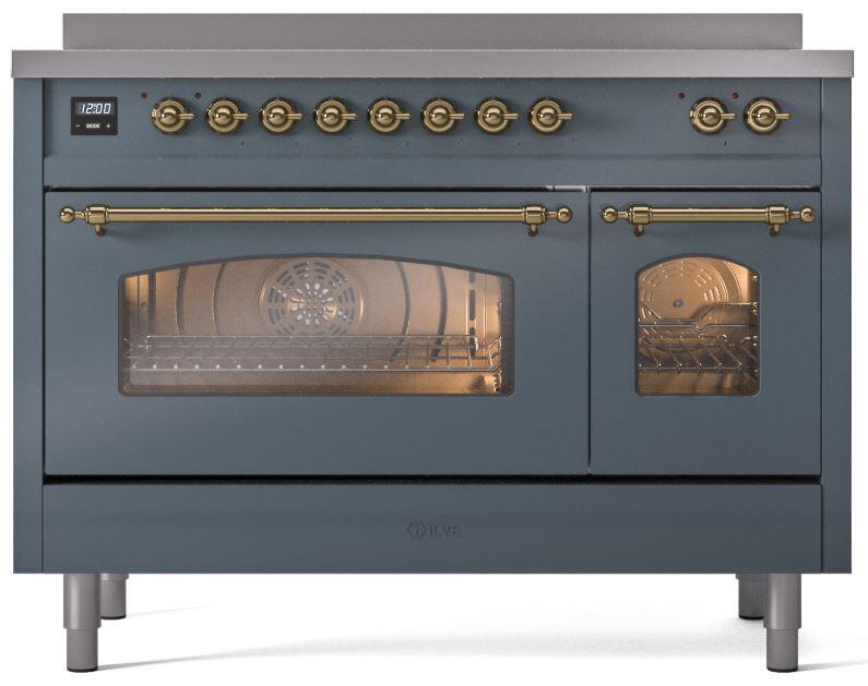 Blue-grey freestanding induction range with both oven doors closed and brass front trim