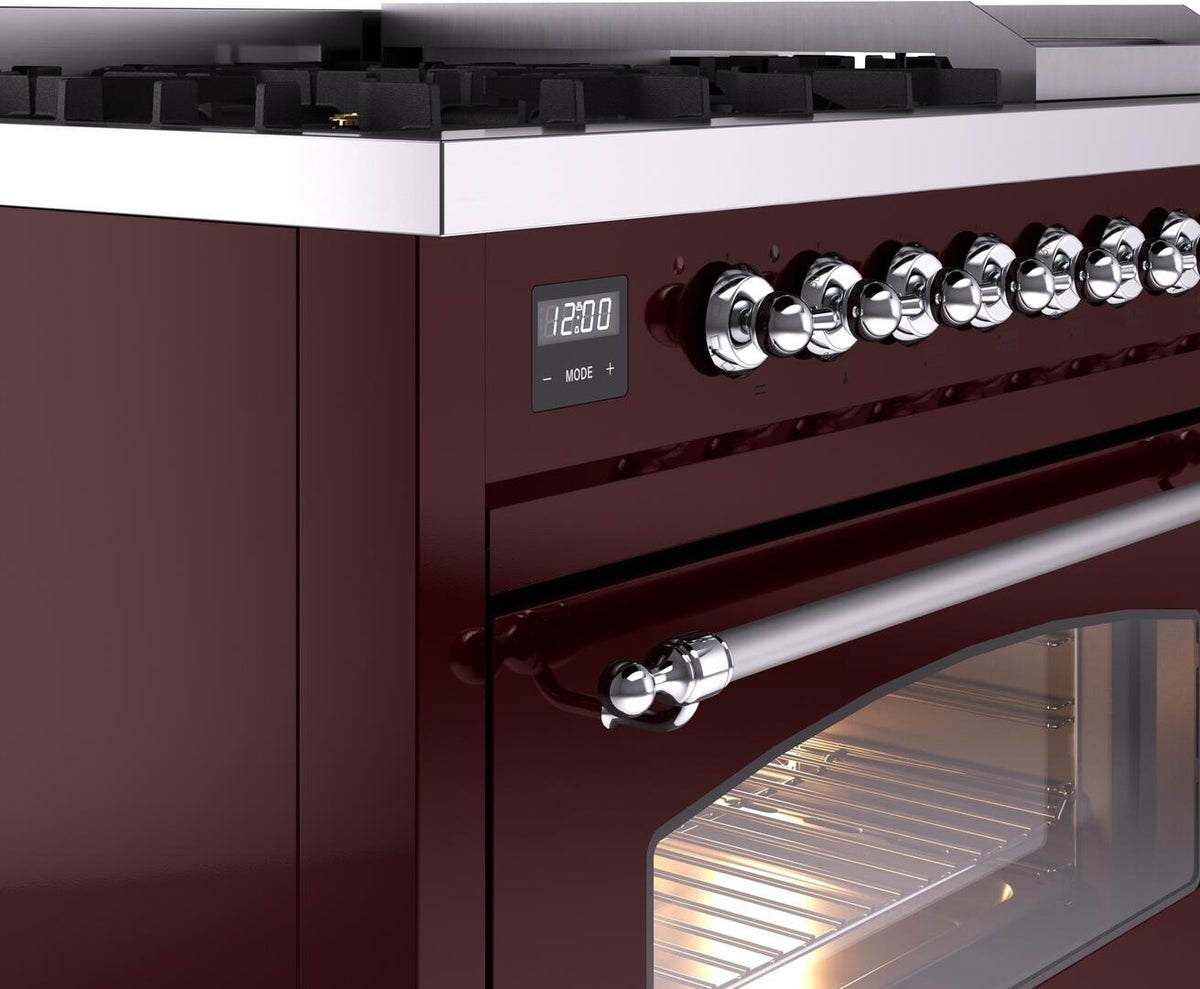 Burgundy range control panel with chrome knobs, handle, and glass oven window