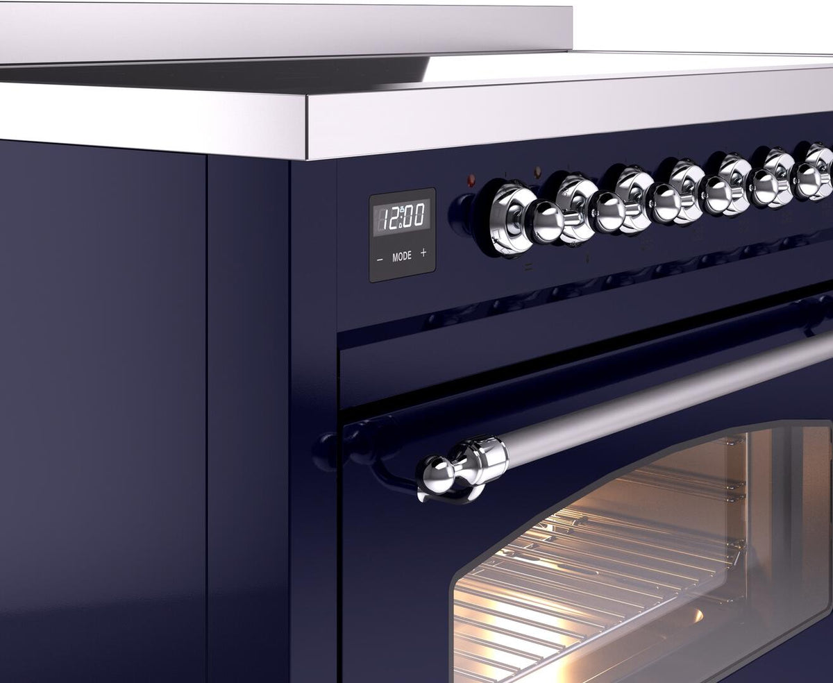 Midnight blue range control knobs and digital display above a chrome oven handle