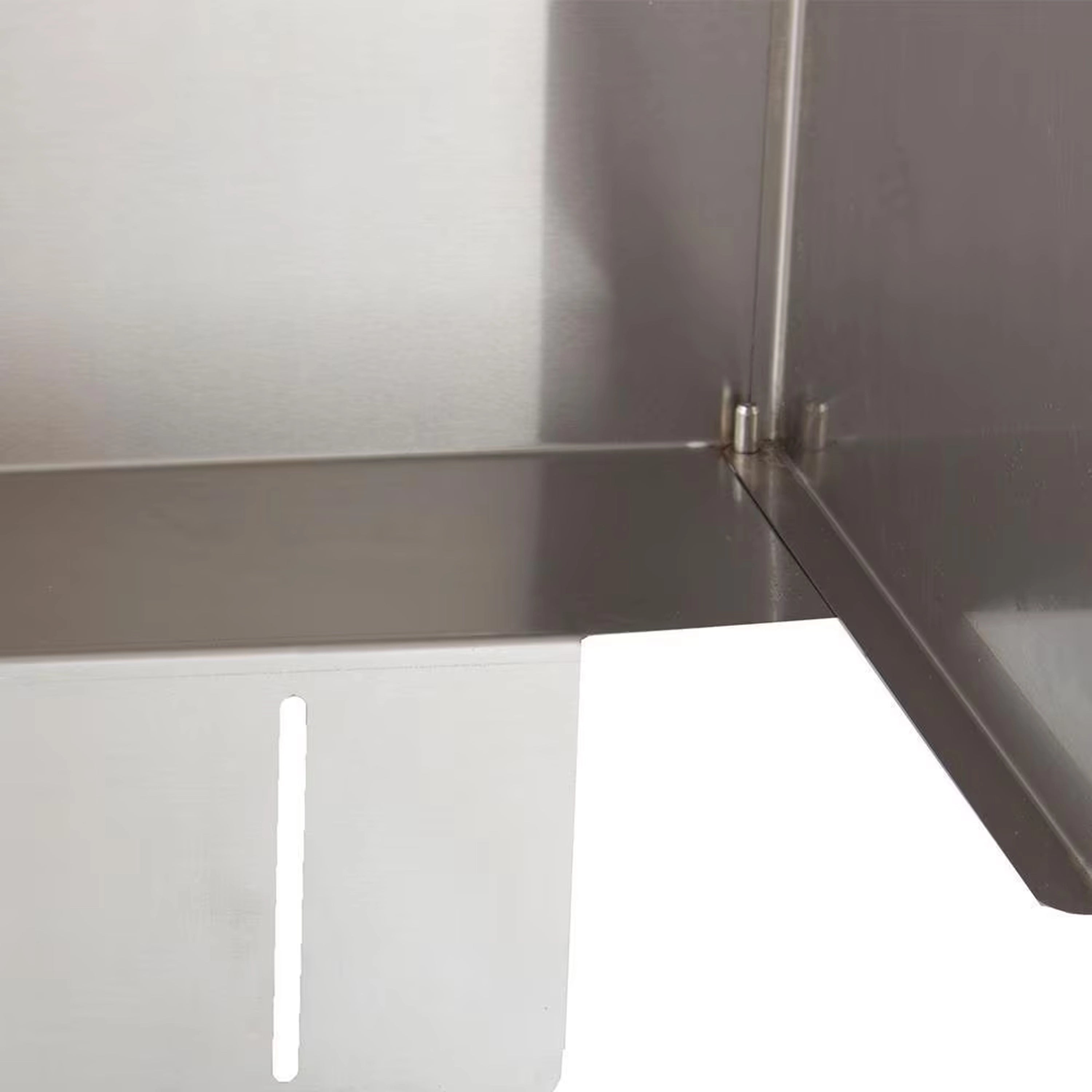 Stainless steel wind guard corner seam and open lower front panel